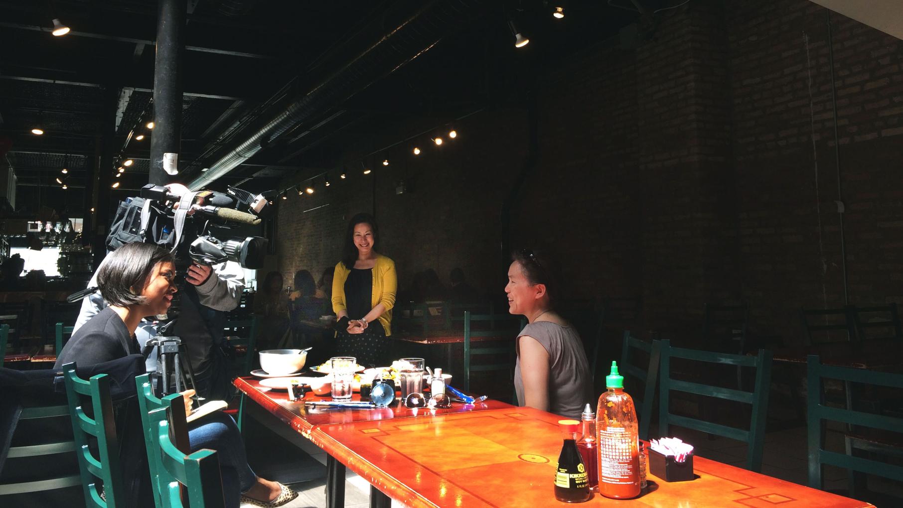 Brandis speaks to two customers at Sun Wah BBQ. Her love of food means she jumps at the chance to cover a story like that at Sun Wah Brandis Friedman at Sun Wah BBQ