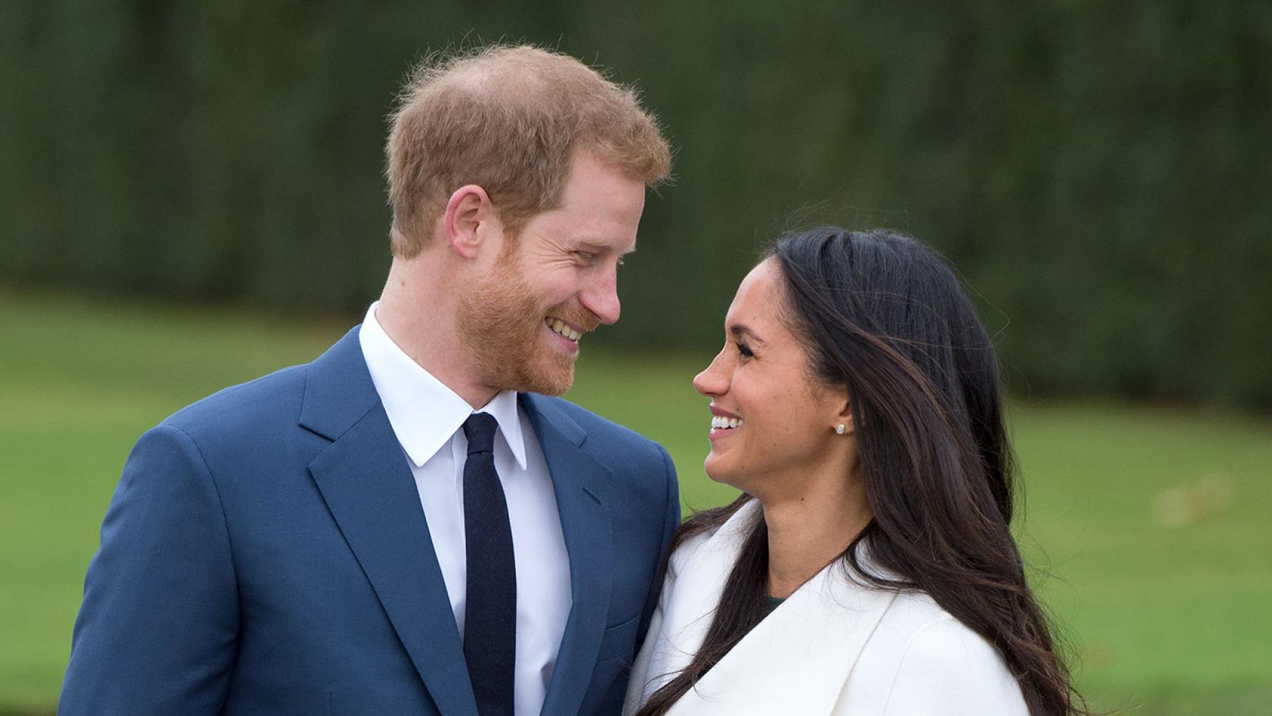 Prince Harry and Meghan Markle at Kensington Palace following the announcement of their engagement on November 27, 2017 in London, England. Photo: Anwar Hussein/Getty Images Prince Harry and Meghan Markle, wearing a white belted coat by Canadian brand Line The Label, attend a photocall in the Sunken Gardens at Kensington Palace following the announcement of their engagement on November 27, 2017 in London, England. Photo: Anwar Hussein/Getty Images