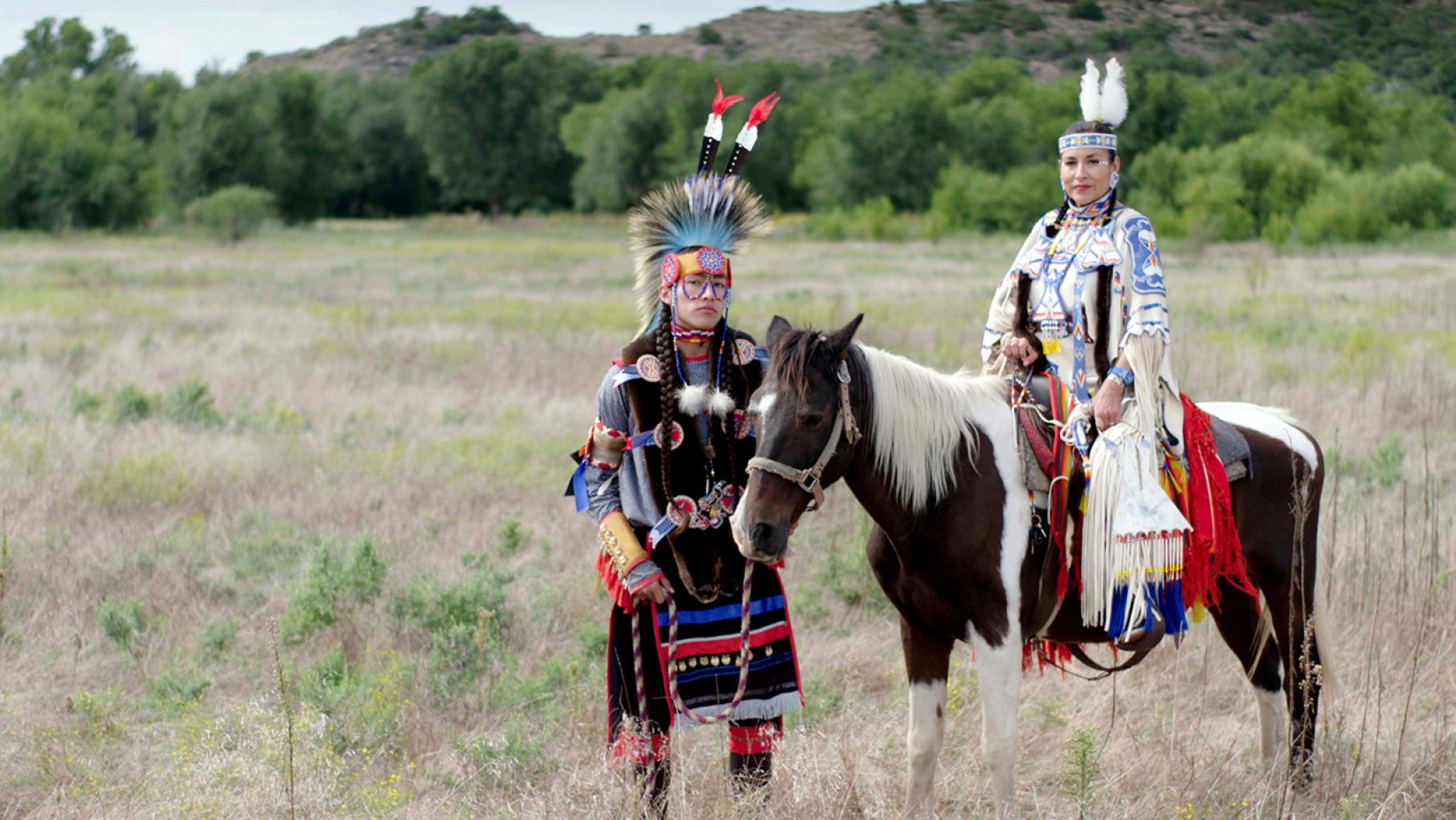 Comanche tribal members Jhane Myers and Philip Bread prepare for their annual fair outside of Lawton, Oklahoma. Photo: Providence Pictures