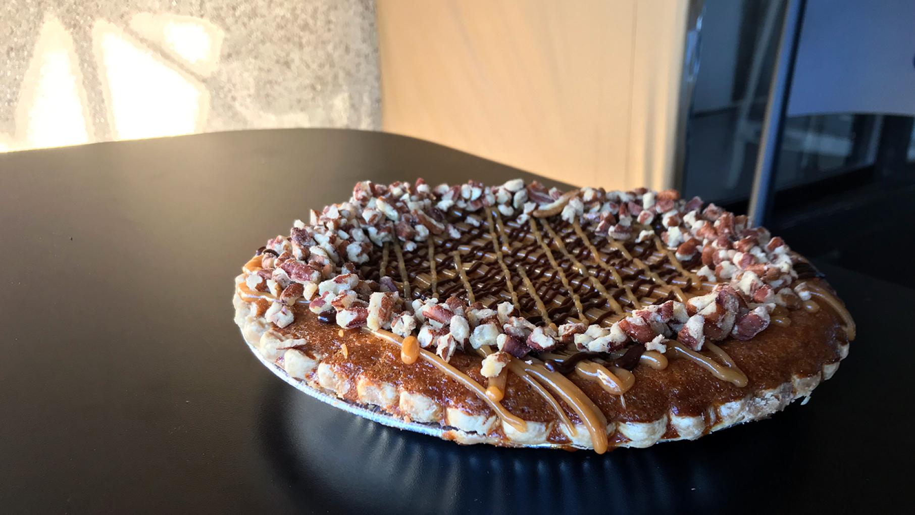 Brown Sugar Bakery's laser pie (sweet potato topped with caramel, chocolate, and pecans) is named after the Lupe Fiasco album 'Lasers' A laser pie from Brown Sugar Bakery in Chicago's Chatham/Grand Crossing