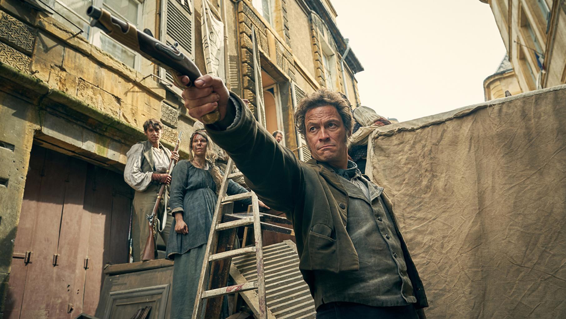 Jean Valjean (Dominic West) at the barricades in Les Miserables. Photo: Robert Viglasky / Lookout Point