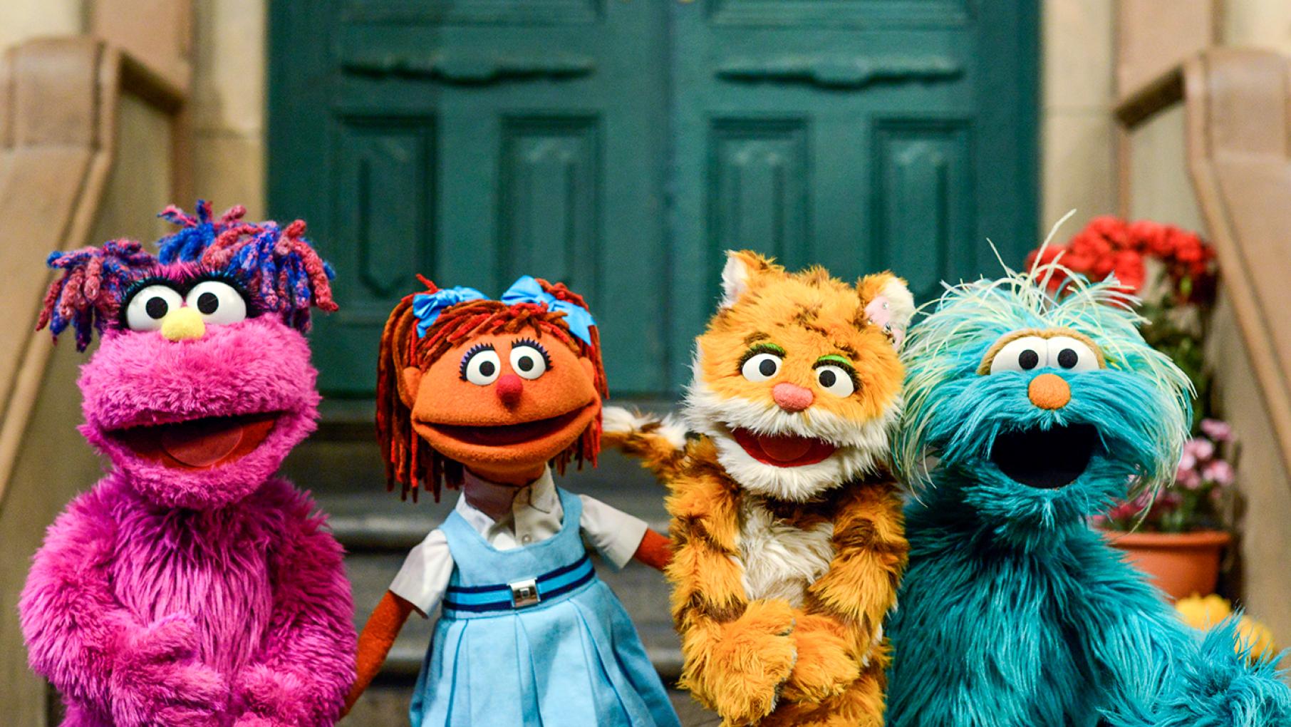 Takalani Sesame's Zuzu, Galli Galli Sim Sim's Chamki, China's Lily, and Rosita on Sesame Street. Photo: Zach Hyman/Sesame Workshop