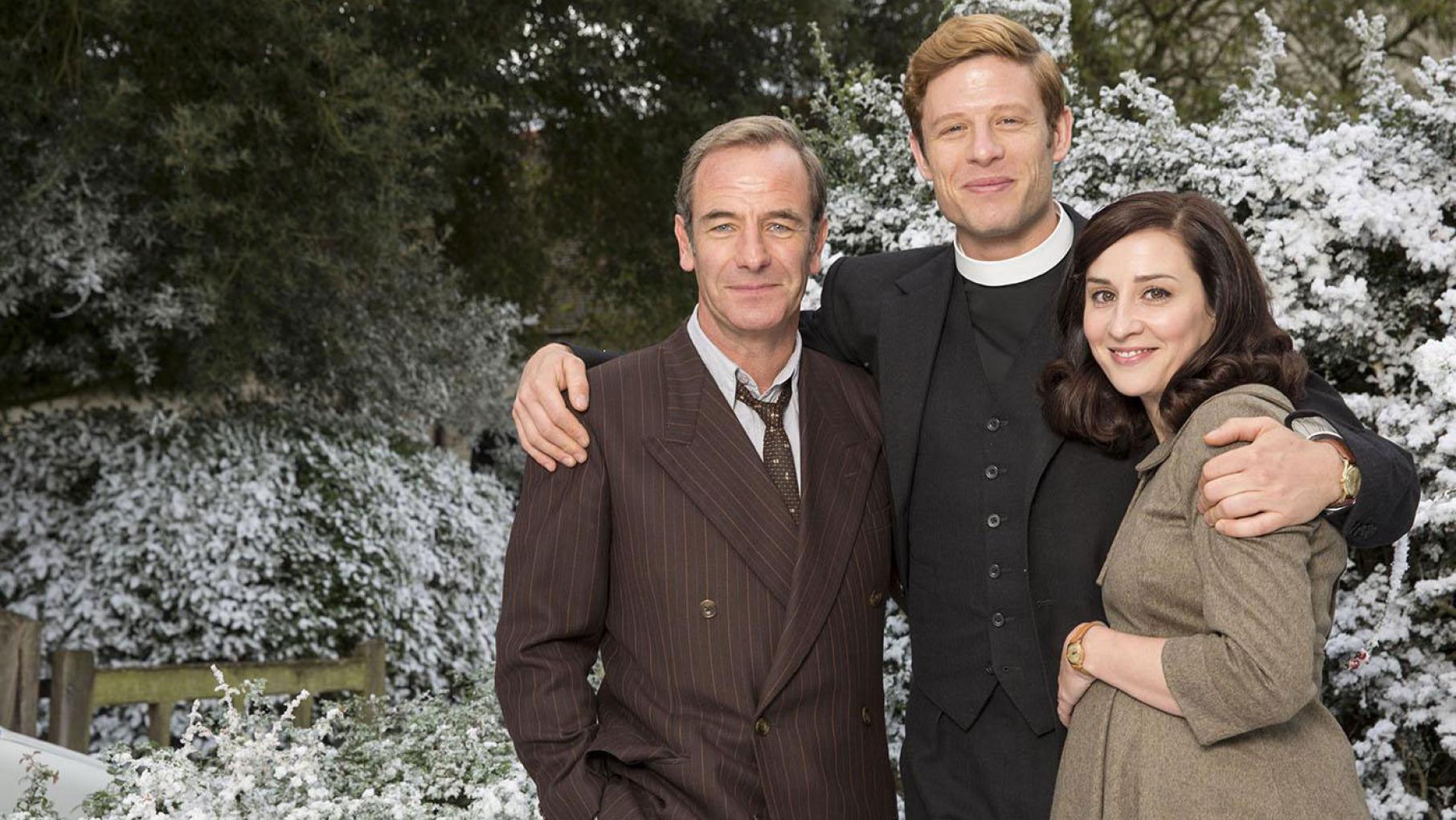It's Christmas in Grantchester. Photo: Colin Hutton and Kudos/ITV for MASTERPIECE Robson Green as Geordie Keating, James Norton as Sidney Chambers and Morven Christie as Amanda in Grantchester. Photo: Colin Hutton and Kudos/ITV for MASTERPIECE