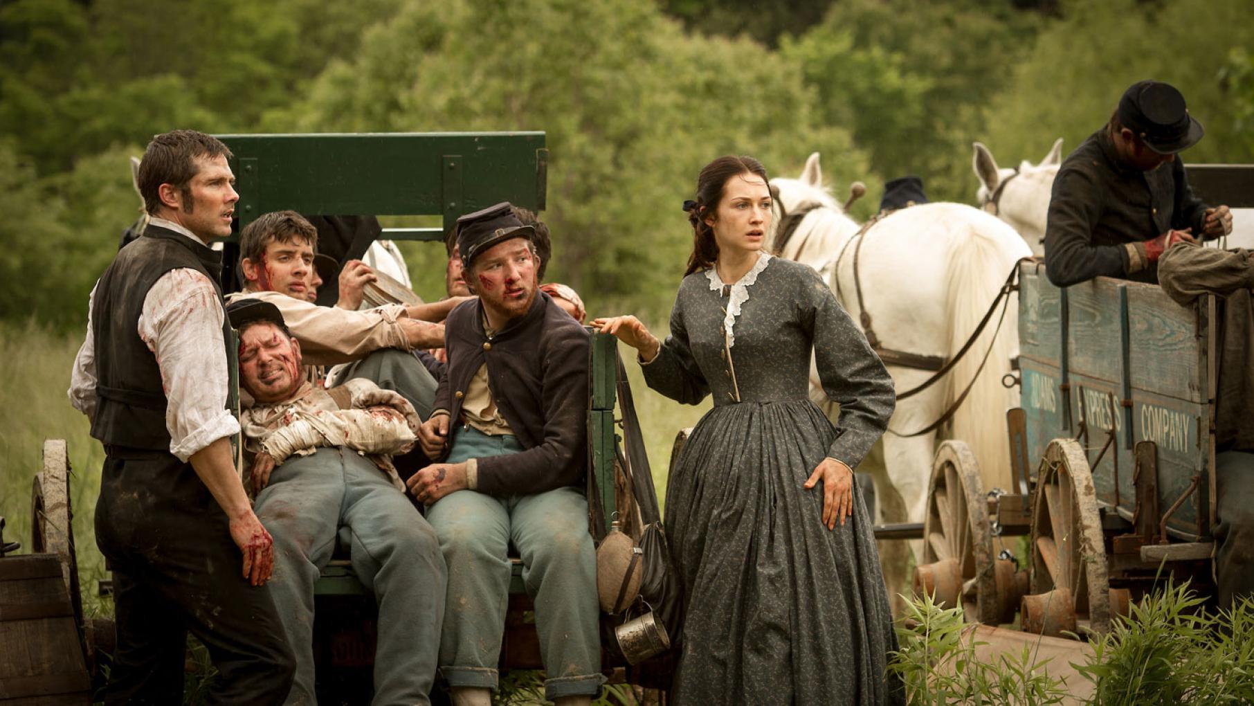 Chaplain Hopkins and Emma Green brave a battlefield to rescue wounded soldiers. (Courtesy of PBS/Erik Heinila)