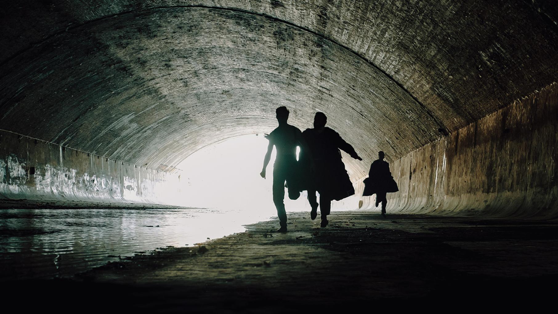 Max and Oskar chase a suspect through a tunnel in Vienna Blood. Photo: Petro Domenigg/2019 Endor Productions/MR Film