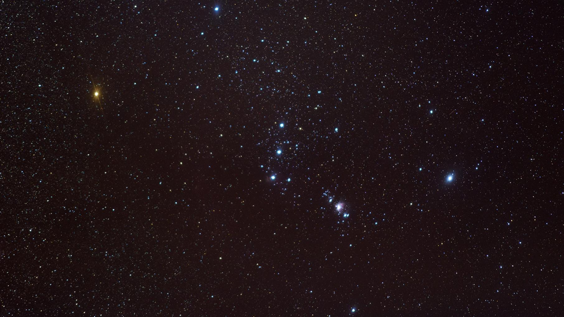 The constellation Orion, with Betelgeuse the reddish star in the top left