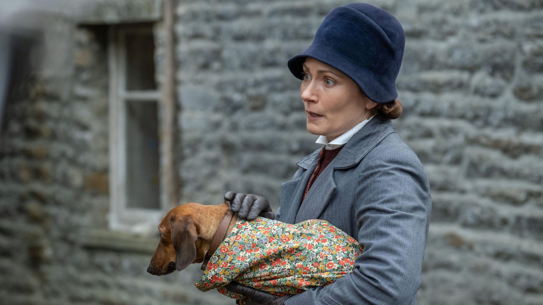Amid the chaos of the Darrowby Fair a dog suffers an injury. Photo: Playground Television UK Ltd & all3media international Mrs. Hall in 'All Creatures Great and Small.' Photo: Playground Television UK Ltd & all3media international