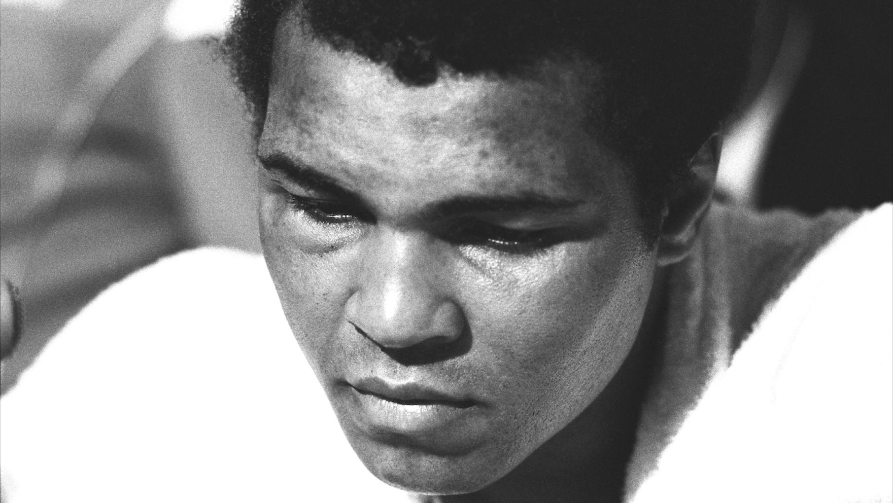 After a shocking loss of the Heavyweight title to Leon Spinks, with swollen eyes Muhammad Ali faces the press conference after the fight. Las Vegas, NV. February 15, 1978. Photo: Courtesy Michael Gaffney After a shocking loss of the Heavyweight title to Leon Spinks, with swollen eyes Muhammad Ali faces the press conference after the fight. Las Vegas, NV. February 15, 1978. Photo: Courtesy Michael Gaffney