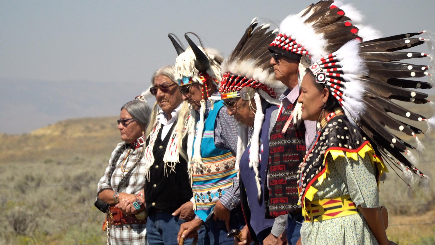Tribals members pay their respects at Little Chief's reburial at Sharp Nose Cemetery, Wind River Reservation, WY in 'Home from School.' Photo: Caldera Productions Tribals members pay their respects at Little Chief's reburial at Sharp Nose Cemetery, Wind River Reservation, WY (From Left: Fay Ann Soldier Wolf, Mark Soldier Wolf, Hubert Friday, Nelson White, Crawford White, Yufna Soldier Wolf), 2017. Photo: Caldera Productions