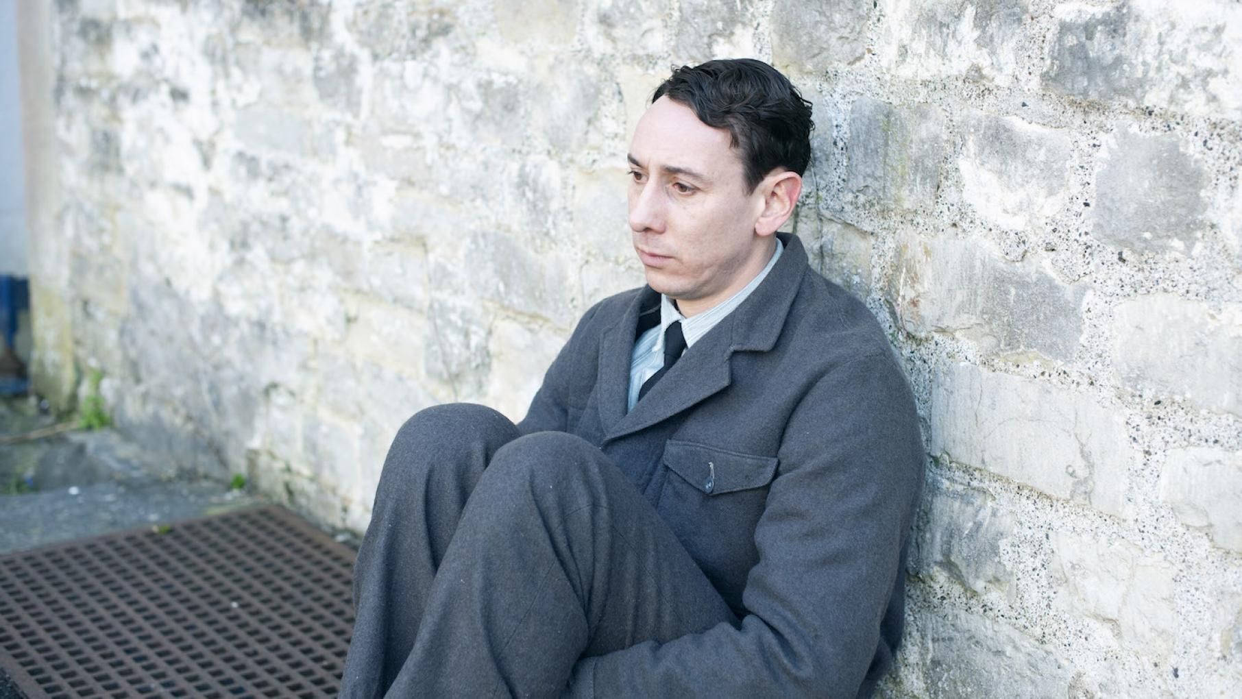Leonard is struggling in prison, but wants to help a fellow inmate. Photo: Masterpiece and Kudos Leonard in prison. Photo: Masterpiece and Kudos