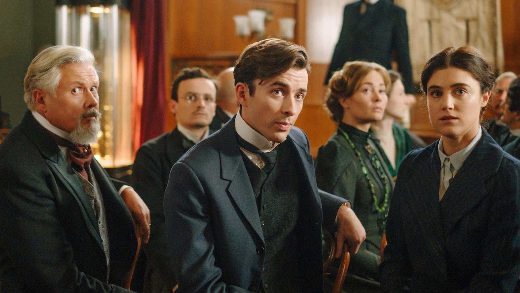 Max, his father, and Amelia witness a confrontation between a Jewish man and an extremist monk. Photo: Endor Production Ltd/MR Film GmbH Max, his father, and Amelia in Vienna Blood. Photo: Endor Production Ltd/MR Film GmbH