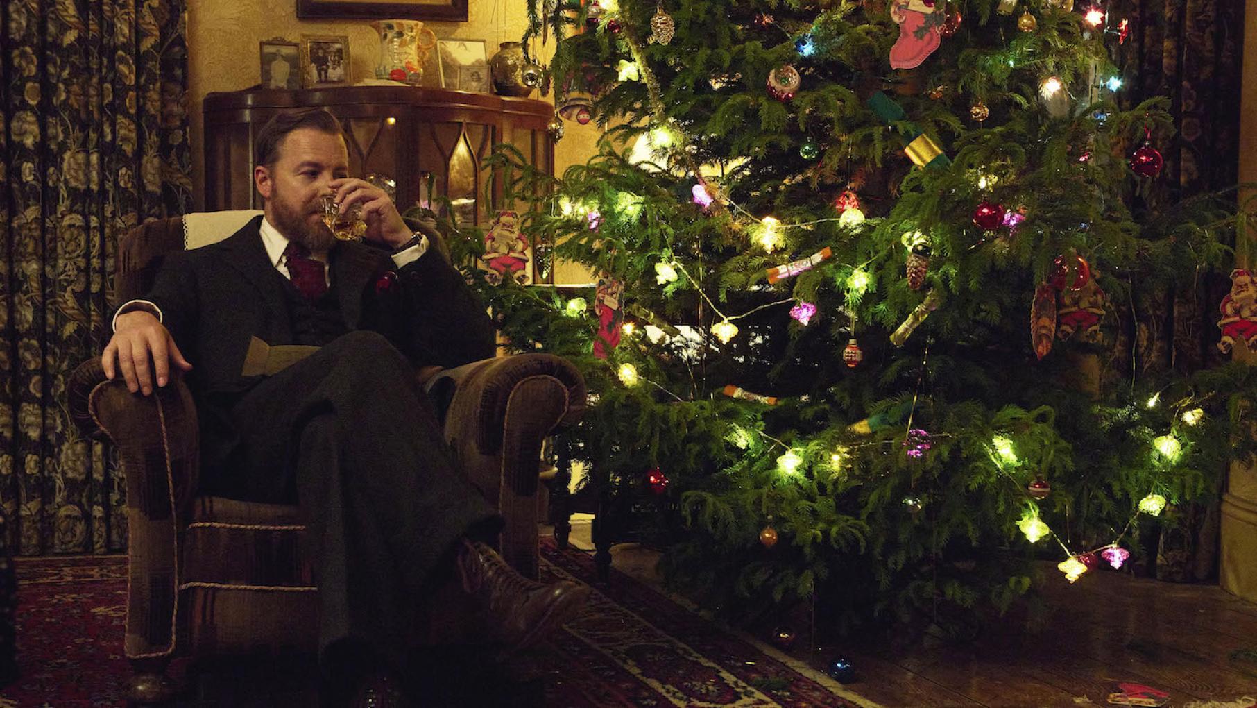 It's Christmas again in the dales. Photo: Playground Television (UK) Ltd. Siegfried by the Christmas tree in season 2 of All Creatures Great and Small. Photo: Playground Television (UK) Ltd.
