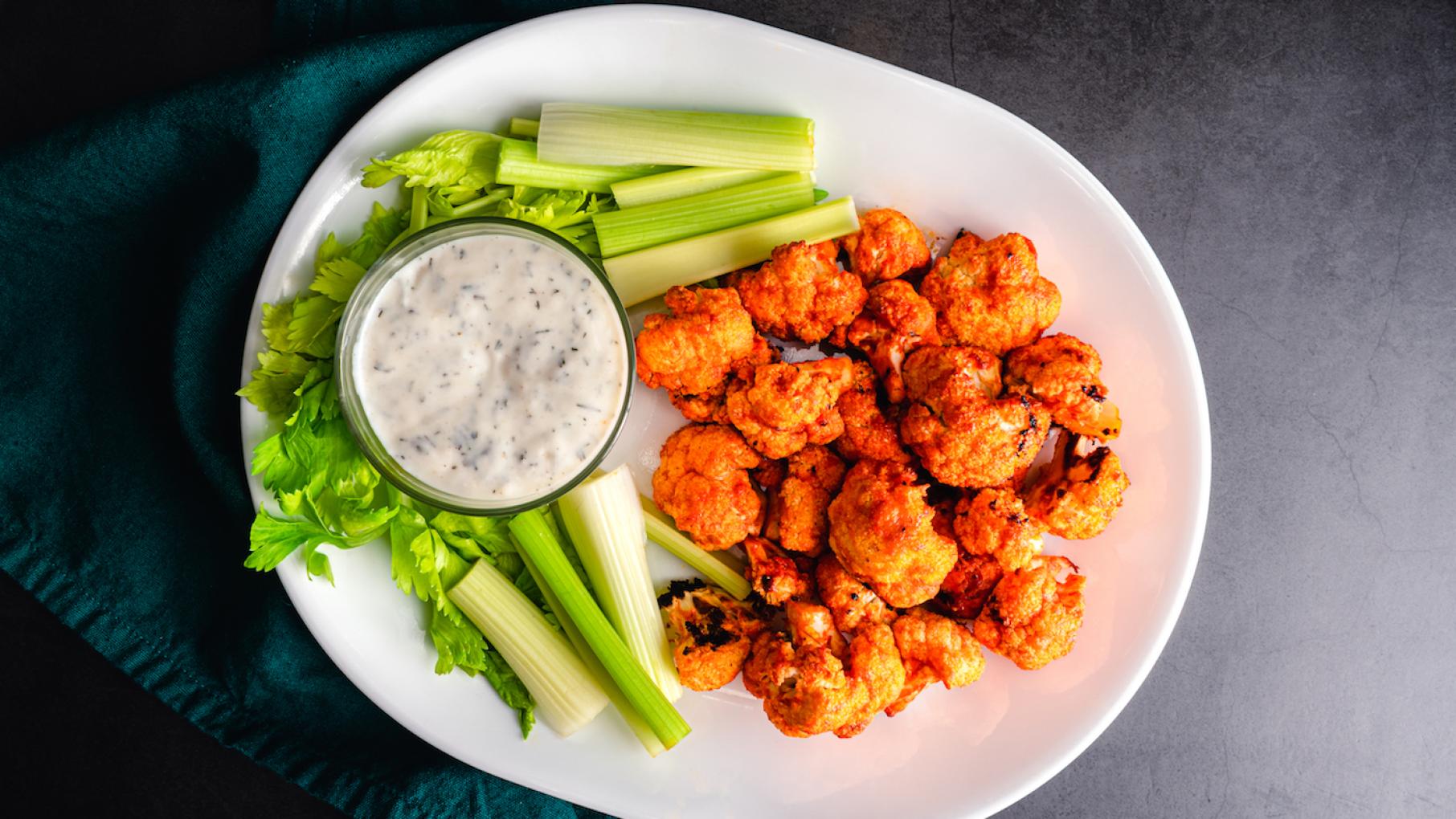 Liz Abunaw envisions the coming brick-and-mortar Forty Acres Fresh Market as "the place where you are in the middle of making a dish," like this buffalo cauliflower, "and you run out of something and you run up two blocks to go get it." Photo: iStock Buffalo cauliflower. Photo: iStock