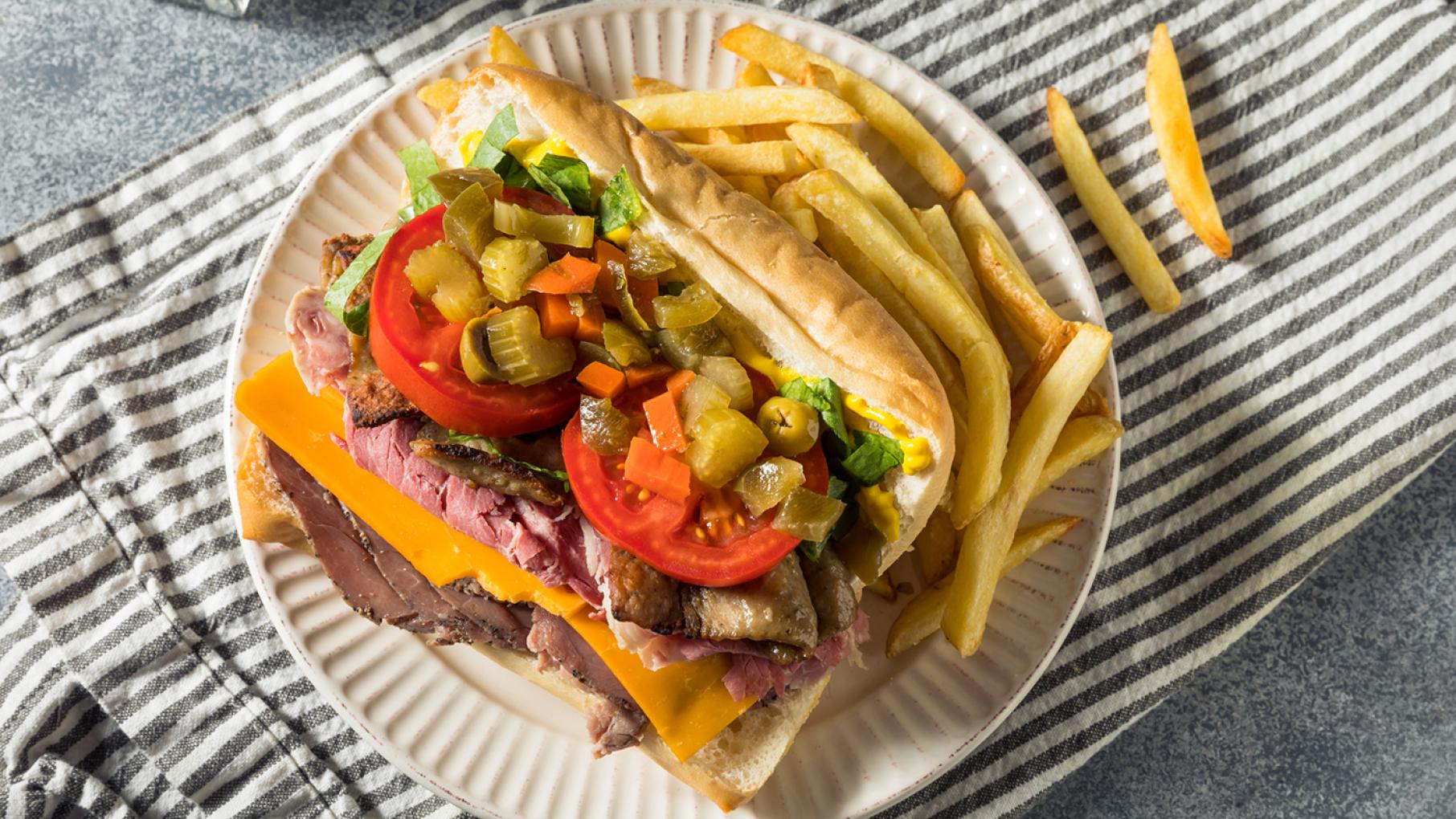 A "gym shoe" or "jim shoe" sandwich on a plate.