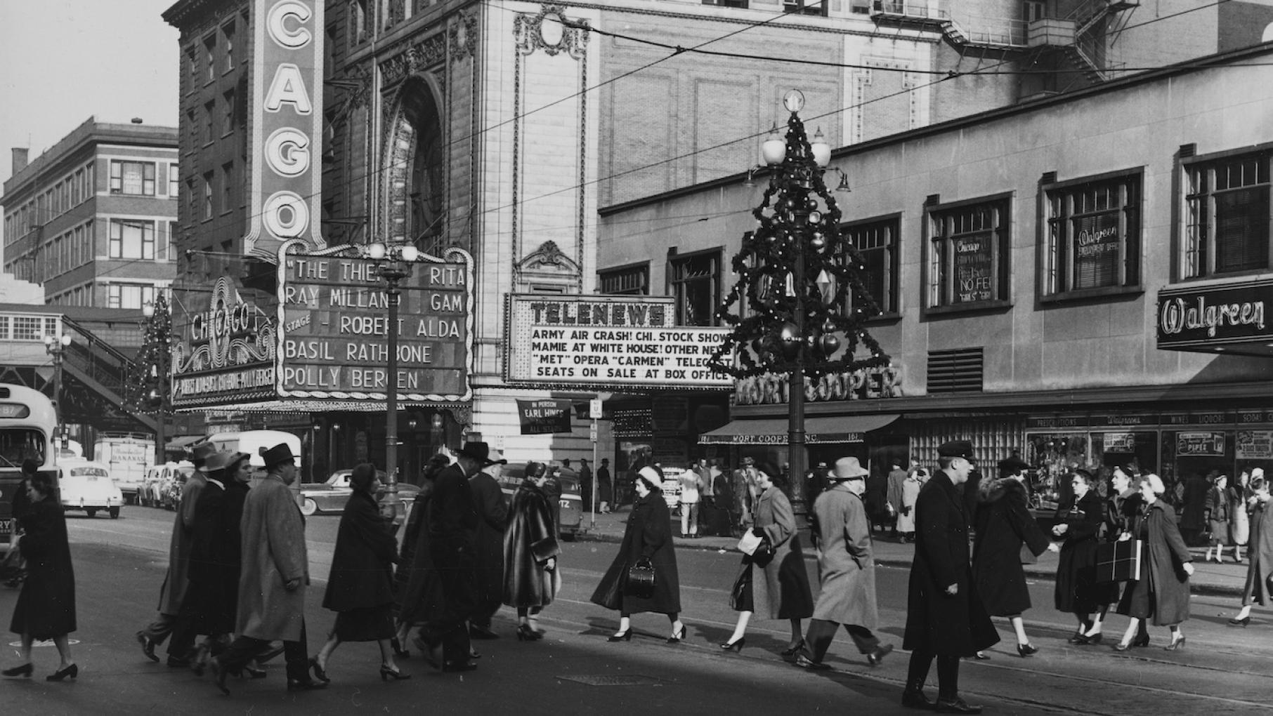 State Street, pictured here in December, 1952, as it looked around the time A.J. Liebling's "Second City" articles were published. Photo: Chicago History Museum, ICHi-019349; J. Sherwin Murphy, photographer Street scene at Chicago Theatre near State and Randolph Streets, Chicago, Illinois, December 10, 1952. Photo: Chicago History Museum, ICHi-019349; J. Sherwin Murphy, photographer