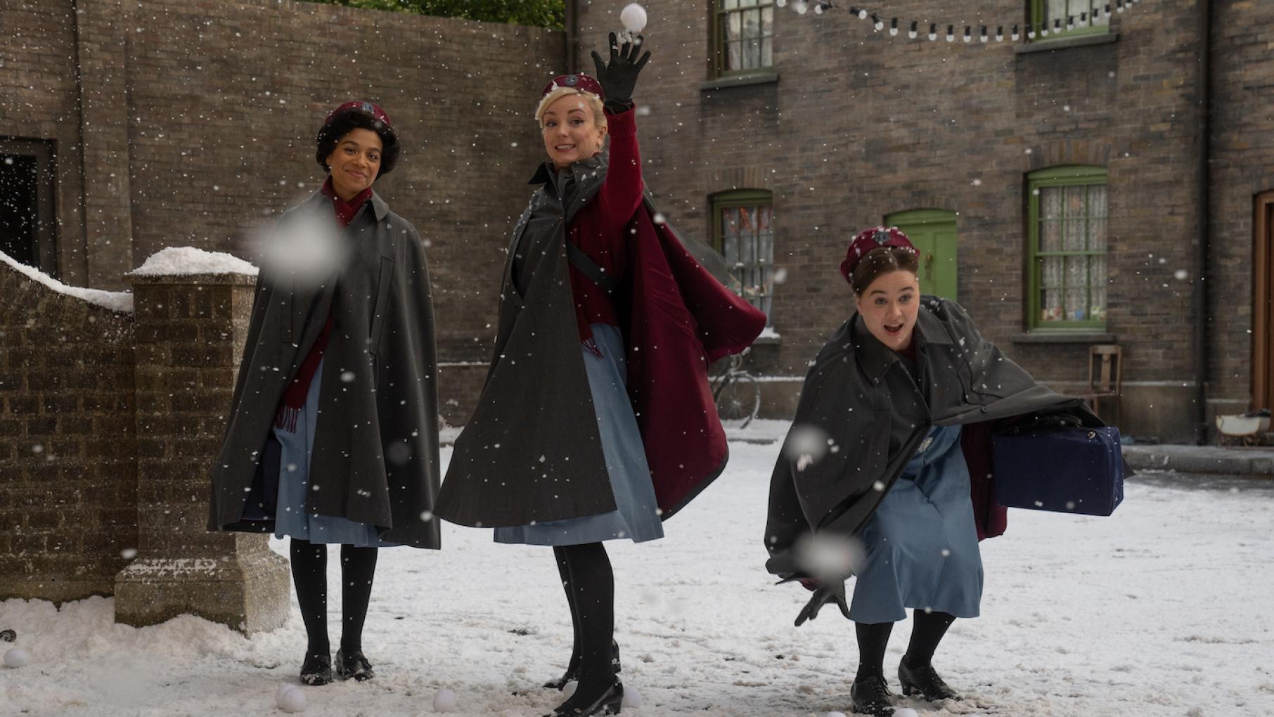 There's fun to be had in Poplar at the holidays, including snowball fights and a talent show. Photo: Neal Street Productions and BBC Studios Lucille, Trixie, and Nancy in the snow in Call the Midwife