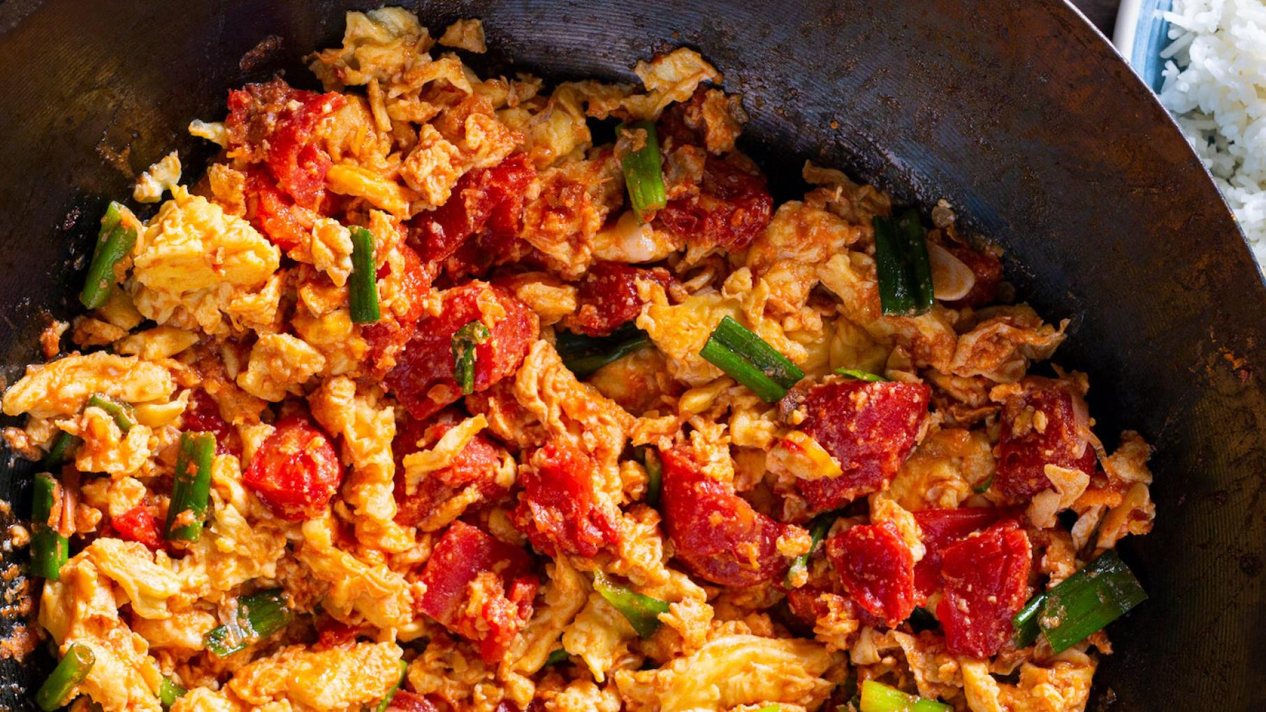Tomatoes and eggs are a classic combination in many Chinese home kitchens Xīhóngshì Chăo Jīdàn (Chinese Stir-Fried Tomatoes and Eggs) from America's Test Kitchen