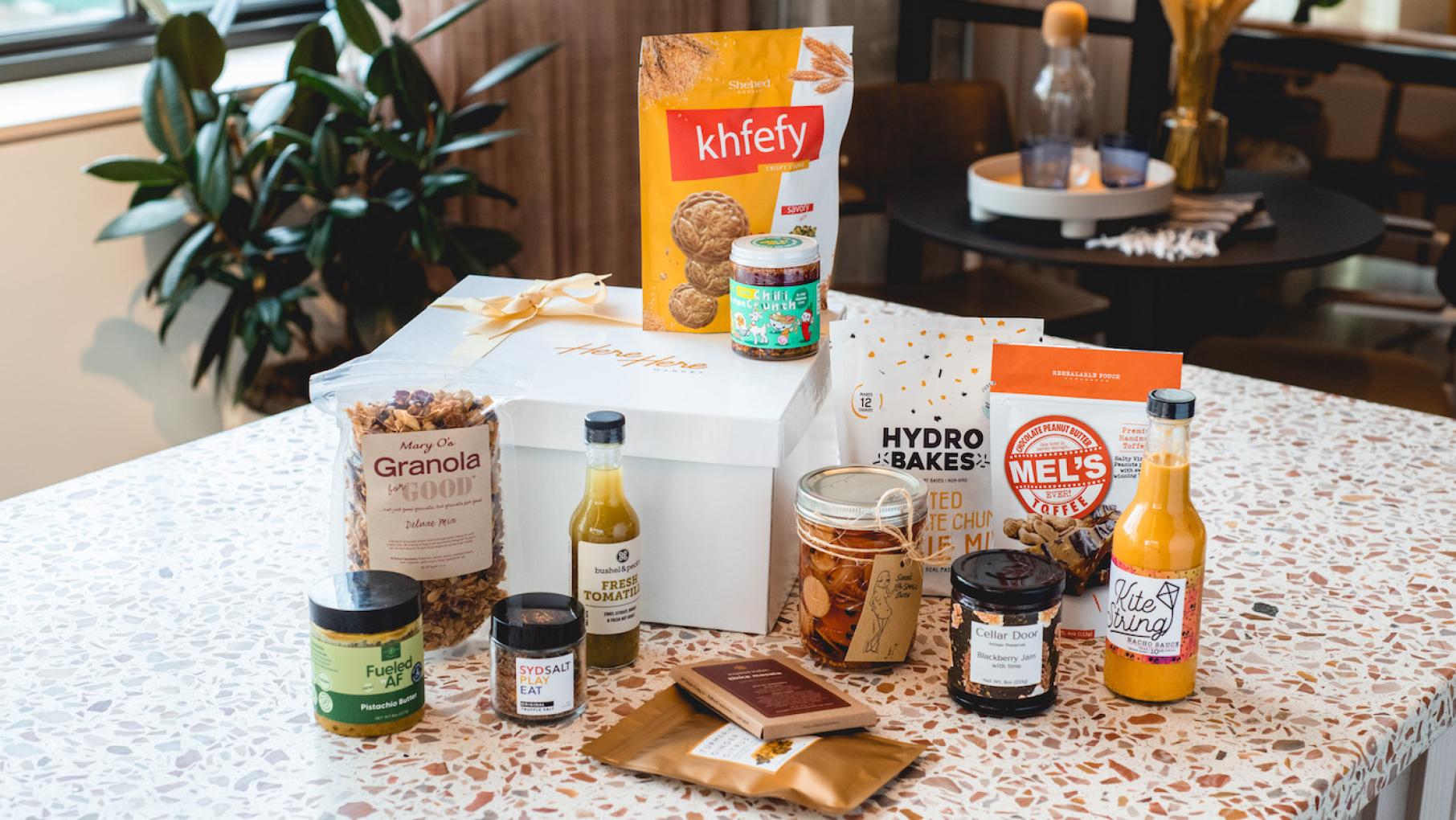 Here Here Market sells specialty food products made by chefs and entrepreneurs in Chicago, both in curated boxes and individually. Photo: Provided A gift box from Here Here Market featuring various products made by Chicago food chefs and entrepreneurs