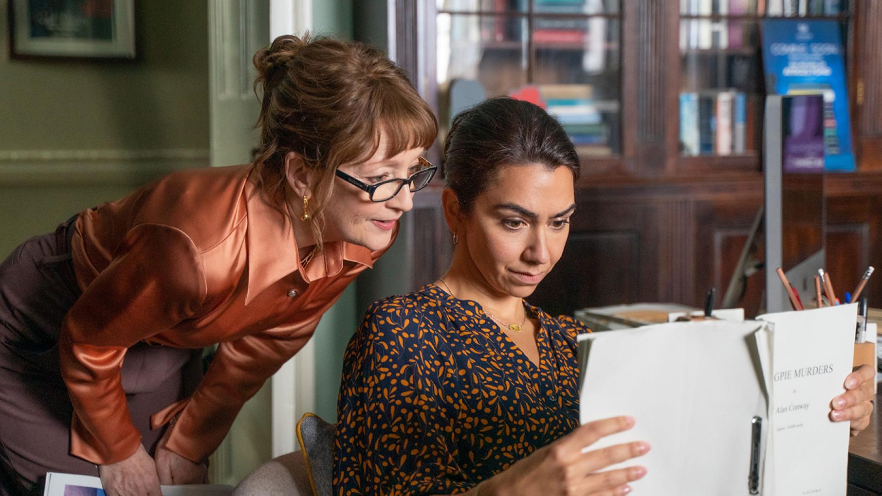 Susan Ryeland and Alice look at the manuscript of Magpie Murders