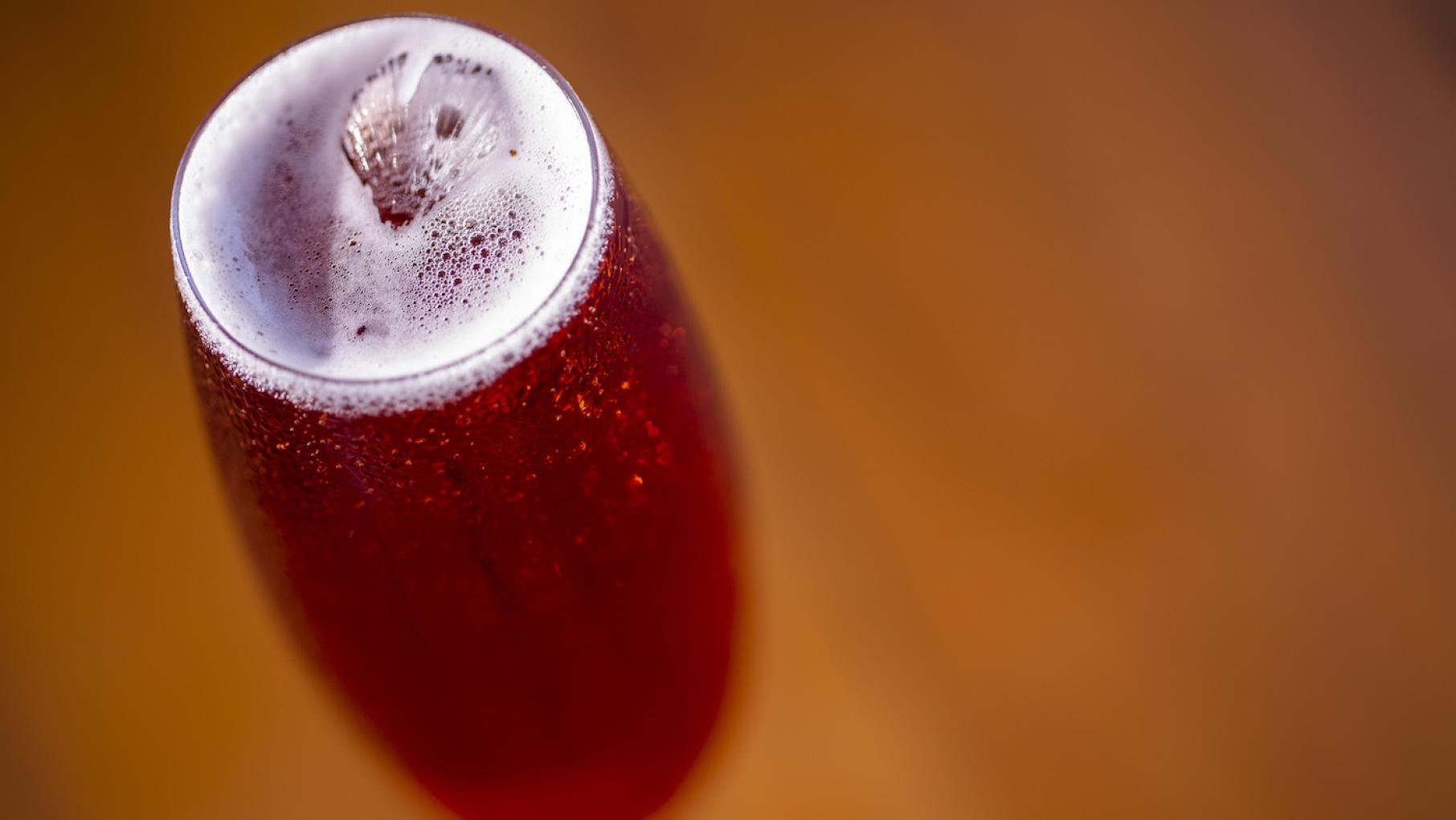 Tia Barrett's riff on a Kir Royale replaces the crème de cassis with several other flavors. A Kir Royale cocktail