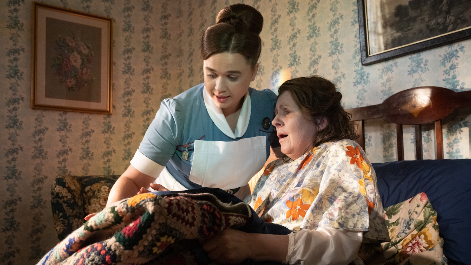 Nancy aids a woman as she dies of a painful cancer at home. Photo: Courtesy BBC/Neal Street Productions/Olly Courtenay Nurse Nancy Corrigan tends to Olive in Call the Midwife.