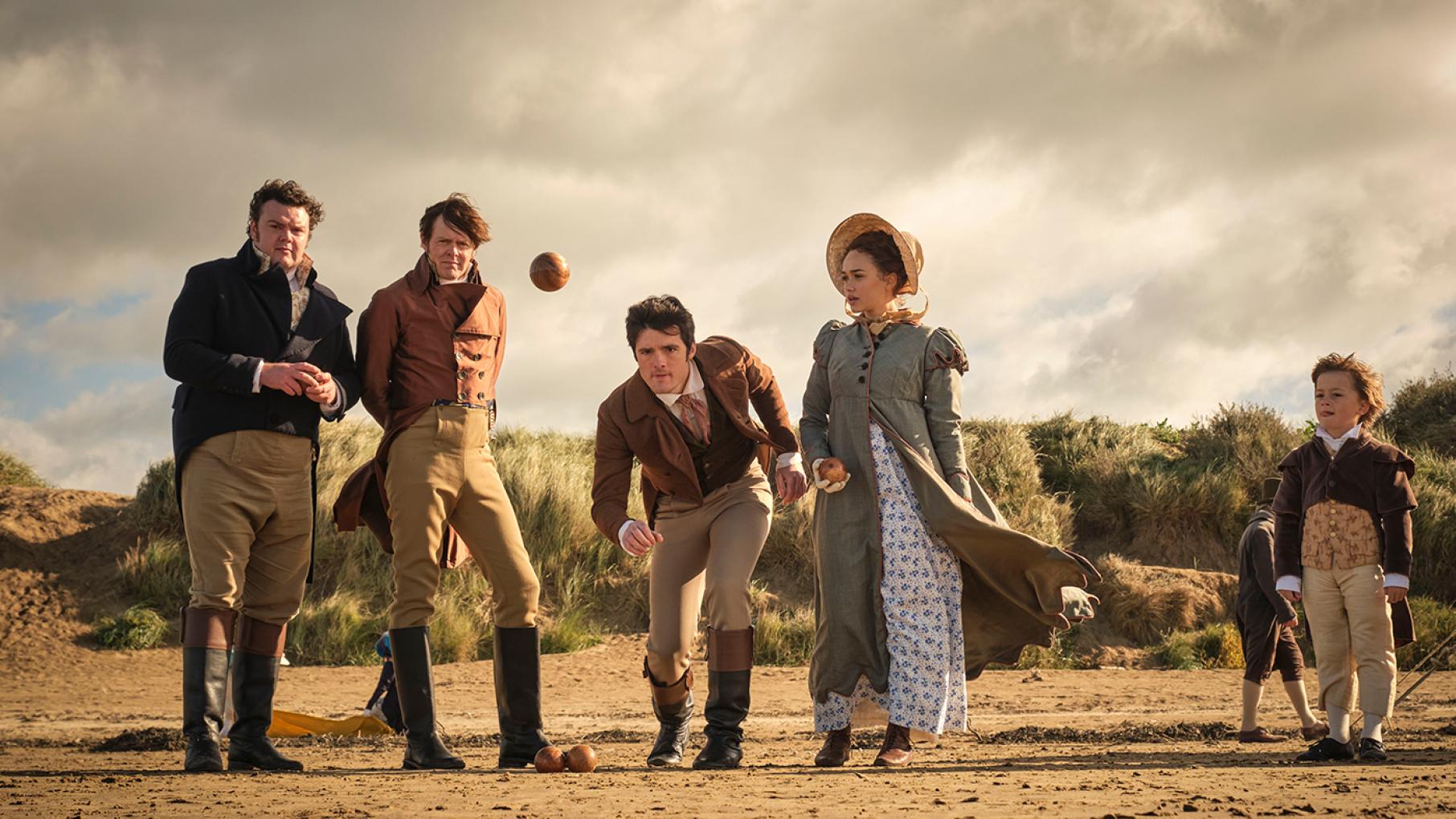 Arthur and Tom Parker with Charlotte and Ralph as they play bocce in Sanditon 