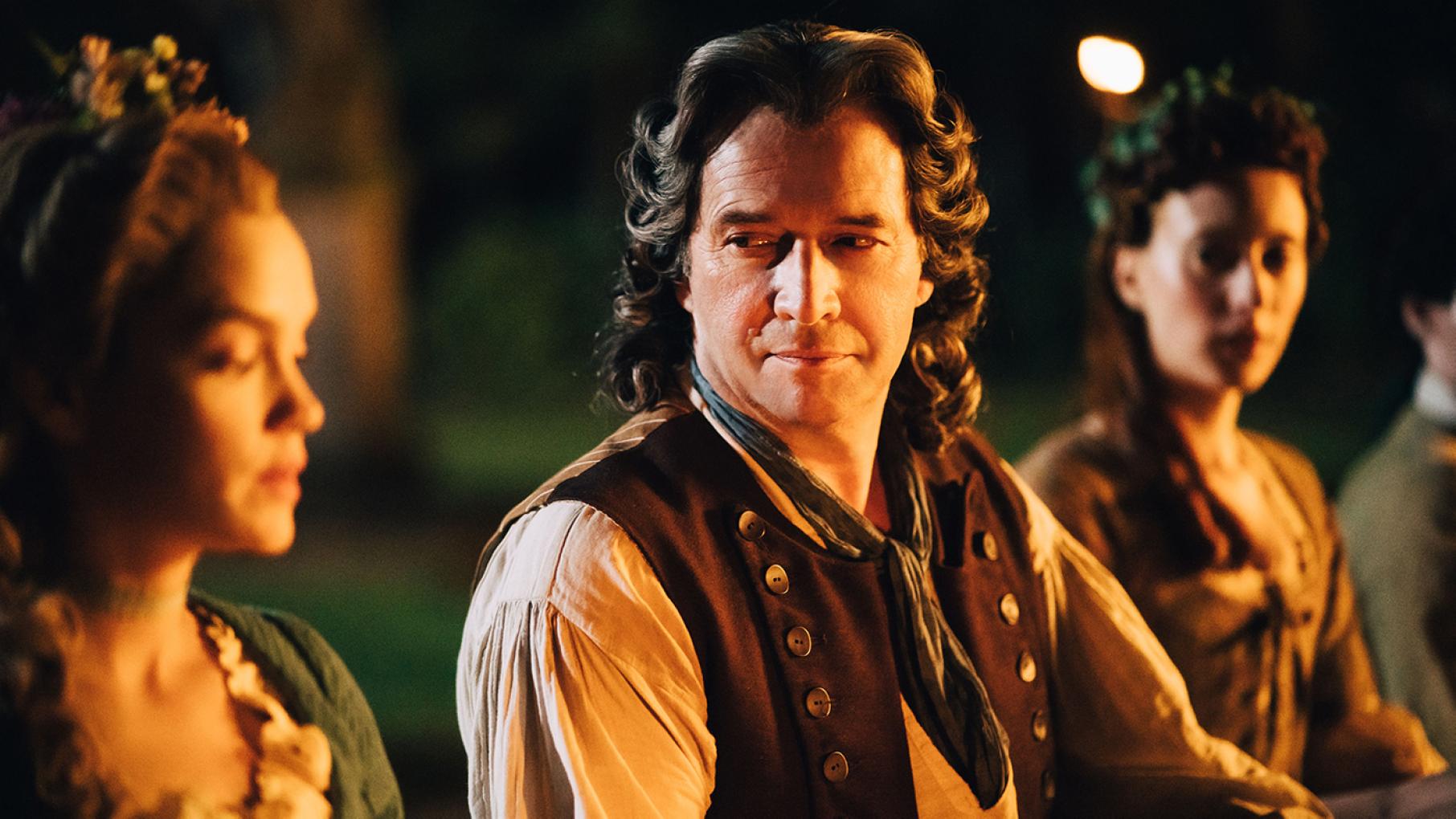 The king has begun taking an interest in Marie Antoinette. Photo: Caroline Dubois - Capa Drama / Banijay Studios France / Les Gens / Canal+ The king of France looks at Marie Antoinette while sitting with her