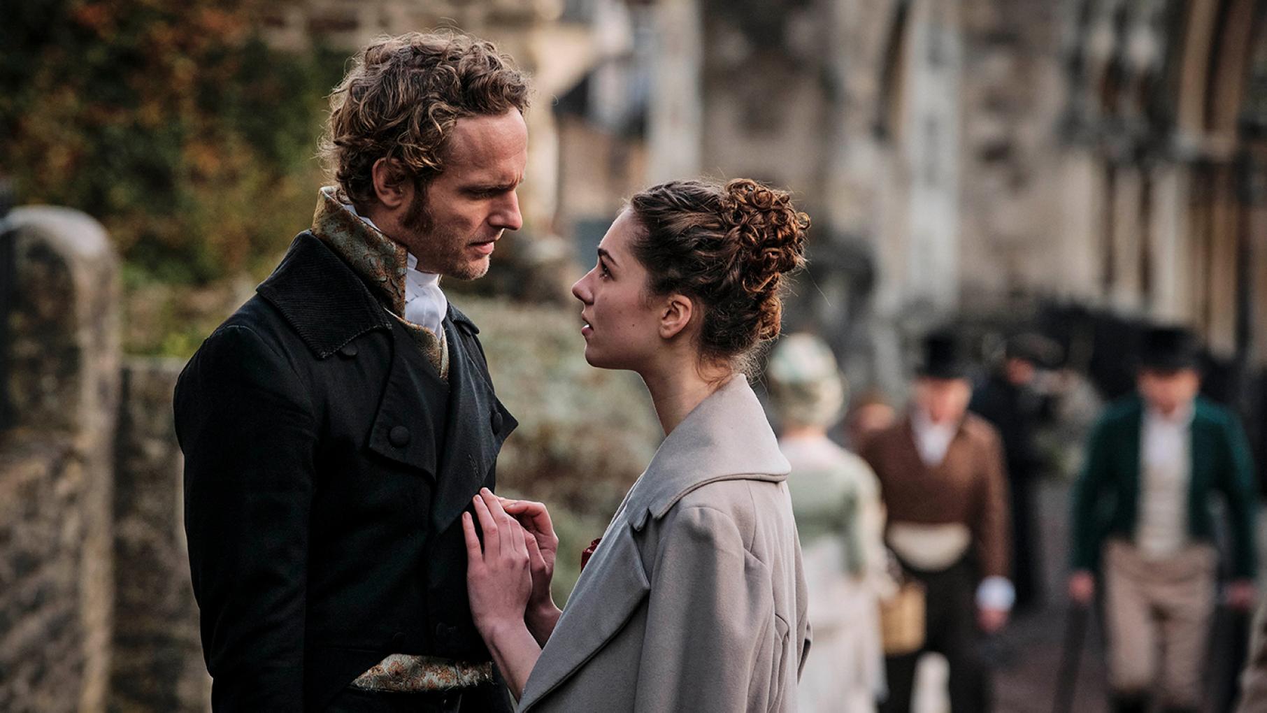 Edward and Augusta are ready to start a life together. Photo: Joss Barratt Edward and Augusta look at each other in the street in Sanditon