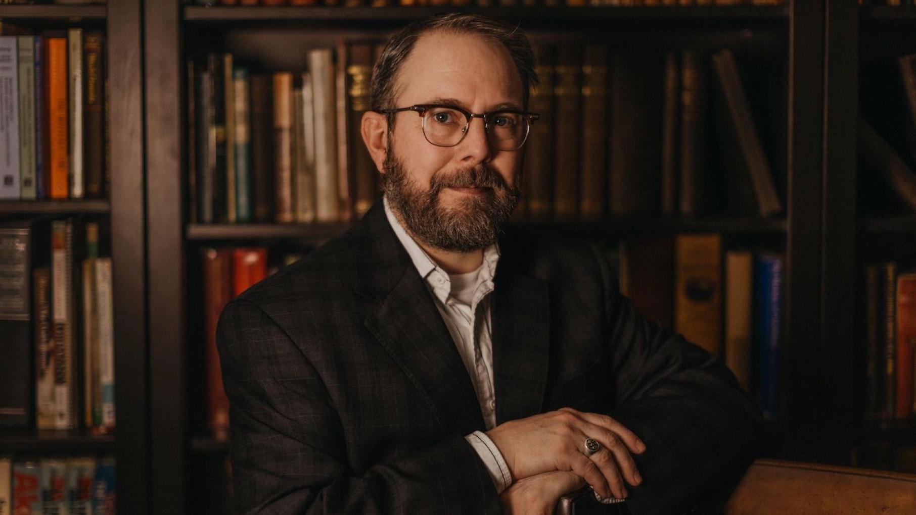 Genealogist Nick Sheedy in a library