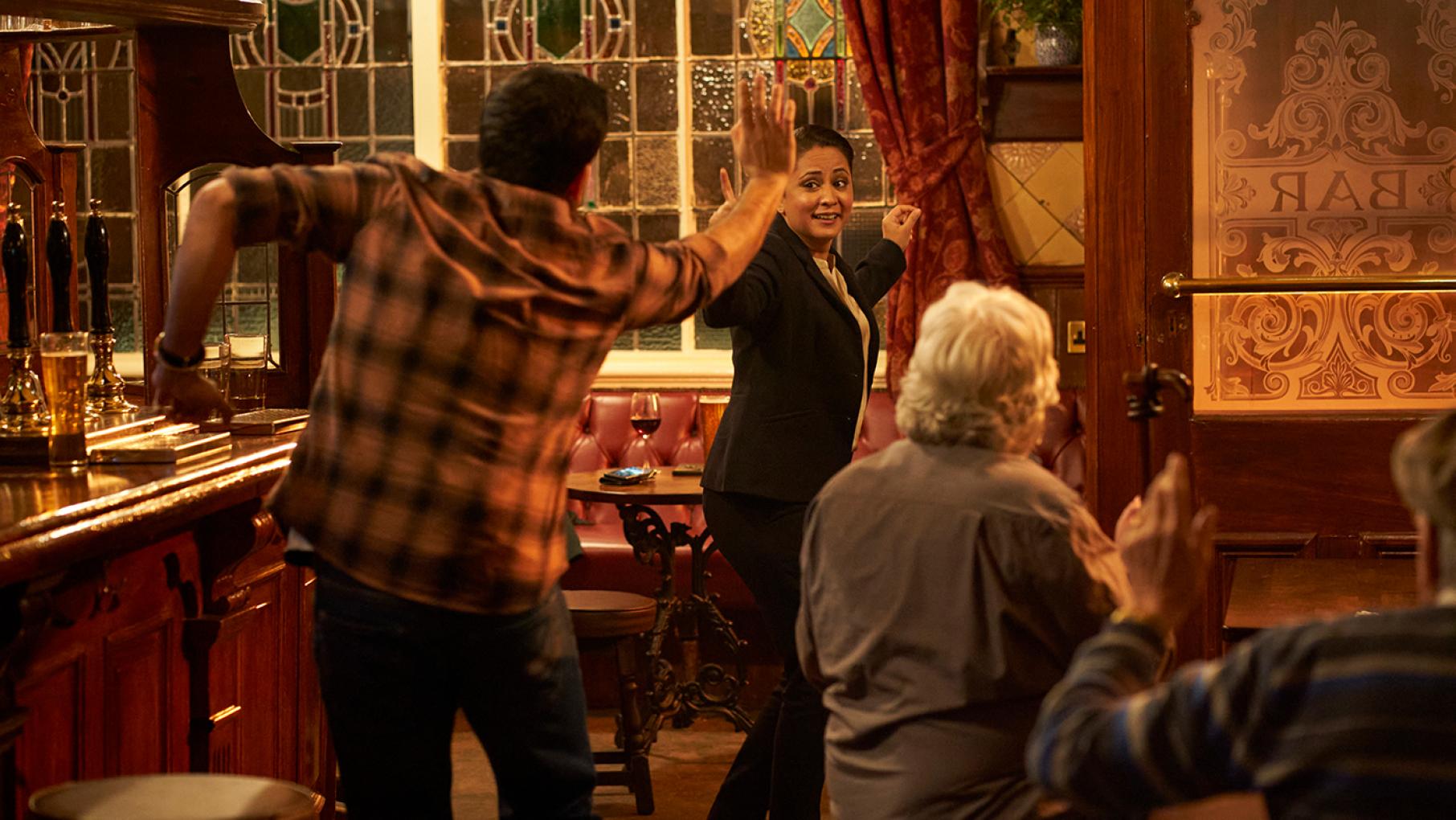 Rachita Ray and Tony Khatri are growing closer as the investigation becomes more trying. Photo: HTM (DI Ray) Tony Khatri and D.I. Ray do a Bollywood dance together in a pub while other people watch and clap