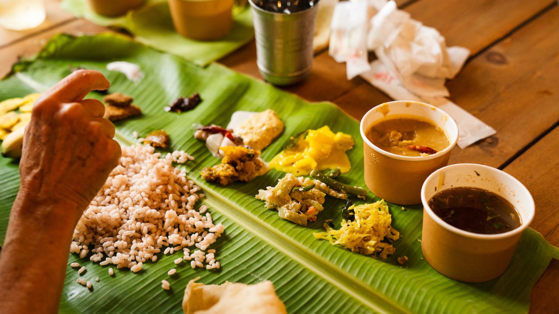 Sadya is a celebratory vegetarian feast served on a banana leaf that is served at the harvest festival of Onam in the southern Indian state of Kerala. Photo: Kristen Mendiola, courtesy Thattu Various Keralite dishes served on a banana leaf for an Onam sadya