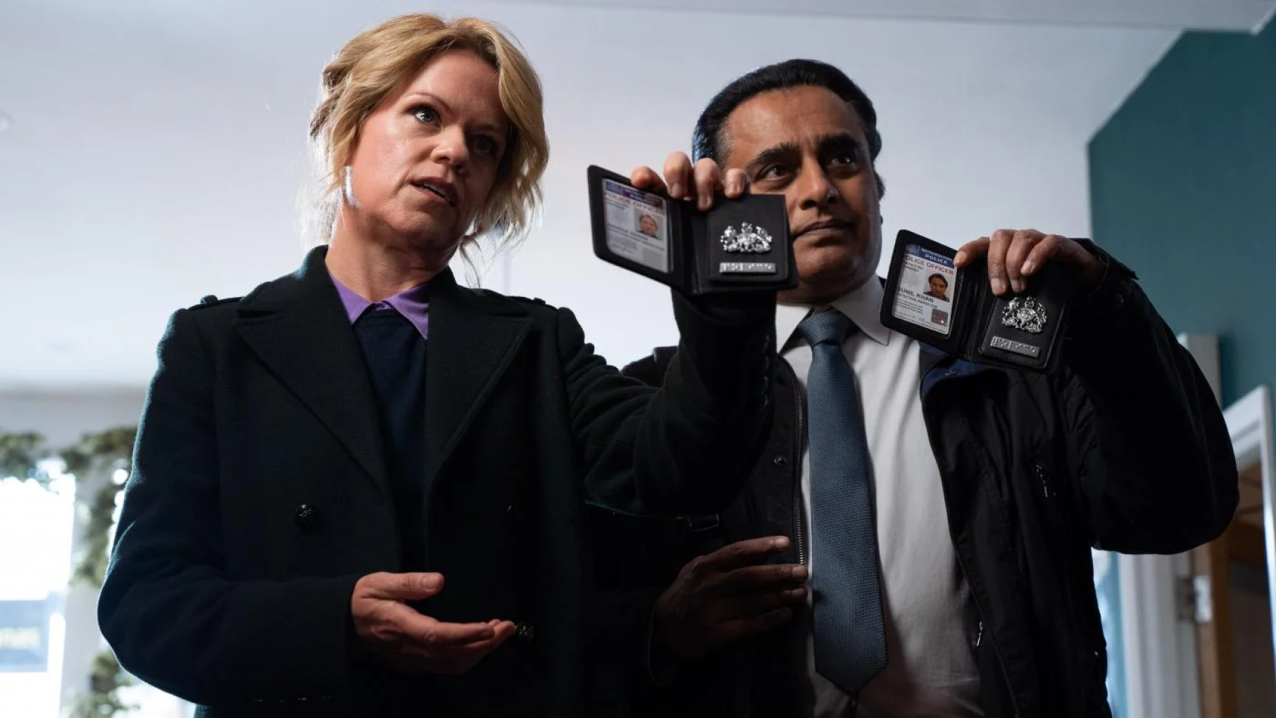 Jess and Sunny's dislike of each other is making working together difficult. Photo: Mainstreet Productions Jess James and Sunny Khan flash their police badges
