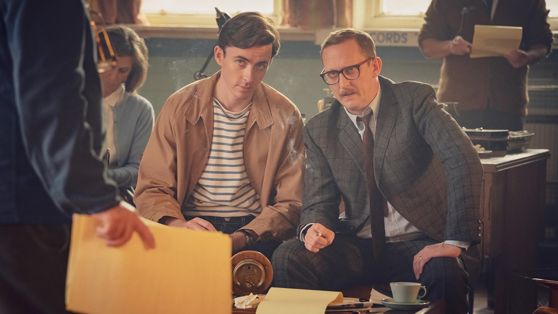 The writers Bill and Tony have taken a liking to Barbara. Credit: Potboiler Productions and Sky UK Limited Two writers sit and look skeptically at someone standing in front of them