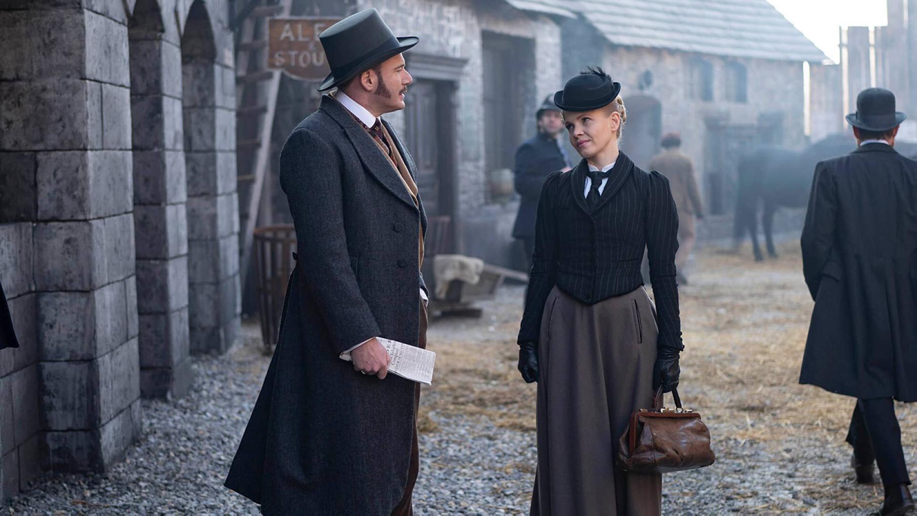 Nash and Eliza continue to clash over running their business. Credit: Playground Entertainment and Masterpiece Nash and Eliza stand in the street