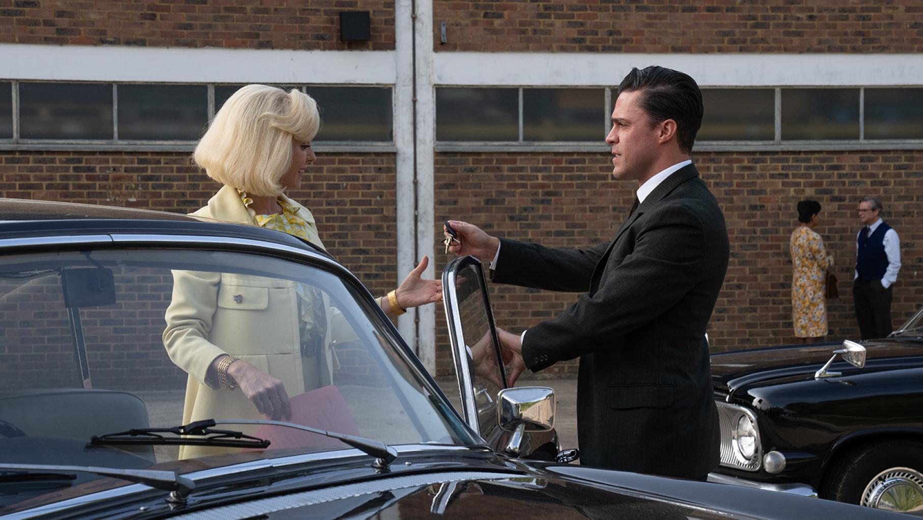 Matthew finally reveals his financial woes to Trixie, right when she was hoping to have a new car. Credit: BBC Studios/Neal Street Productions Matthew hands Trixie keys next to a car