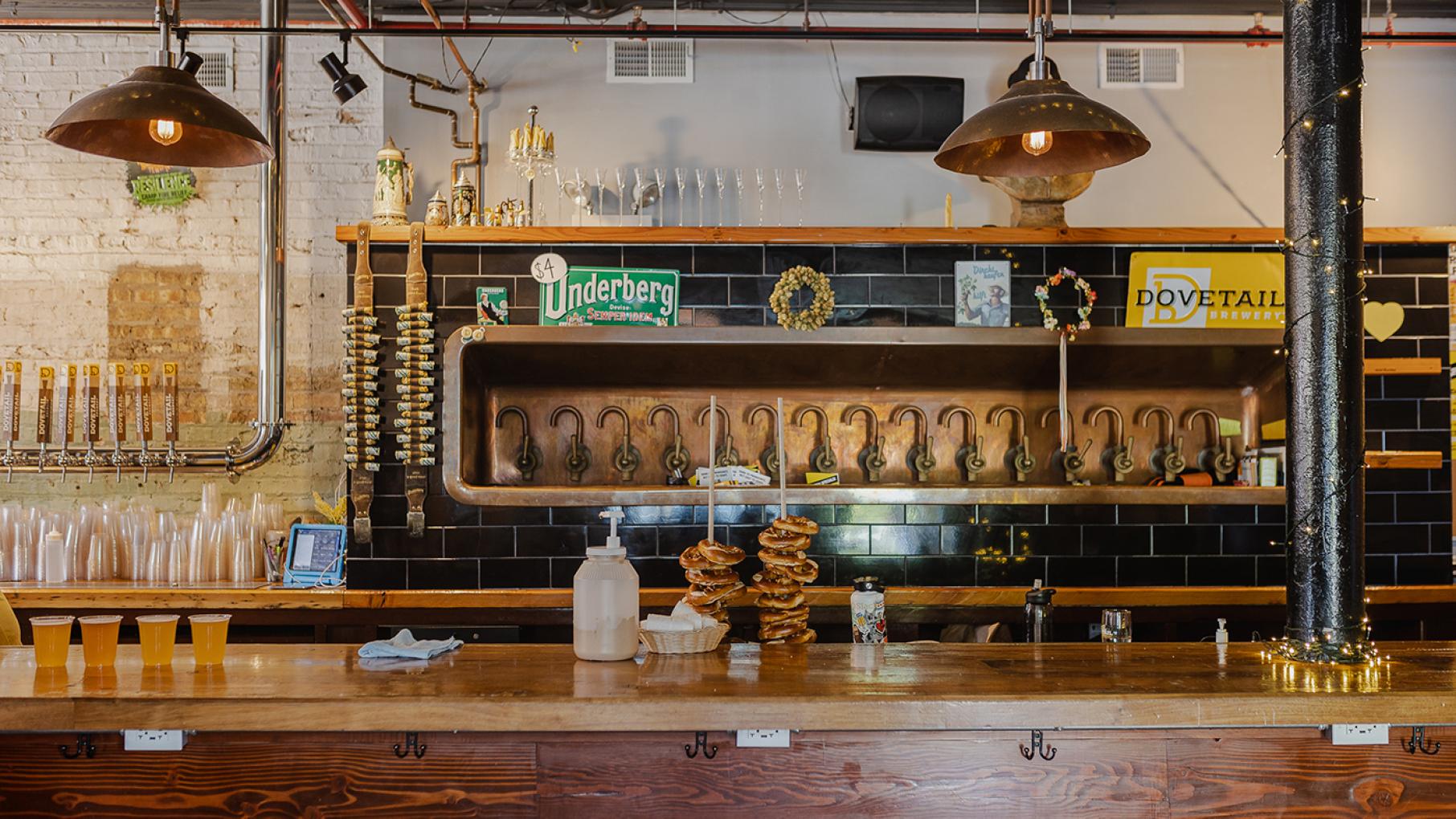 Unhappy with any of the lagers they had tasted in America, Dovetail Brewery's founders sought to replicate their favorites from Europe, using traditional methods and rigorous exactitude. Credit: Courtesy Dovetail Brewery/Steph Byce Dovetail Brewery's bar, with some beers lined up on it