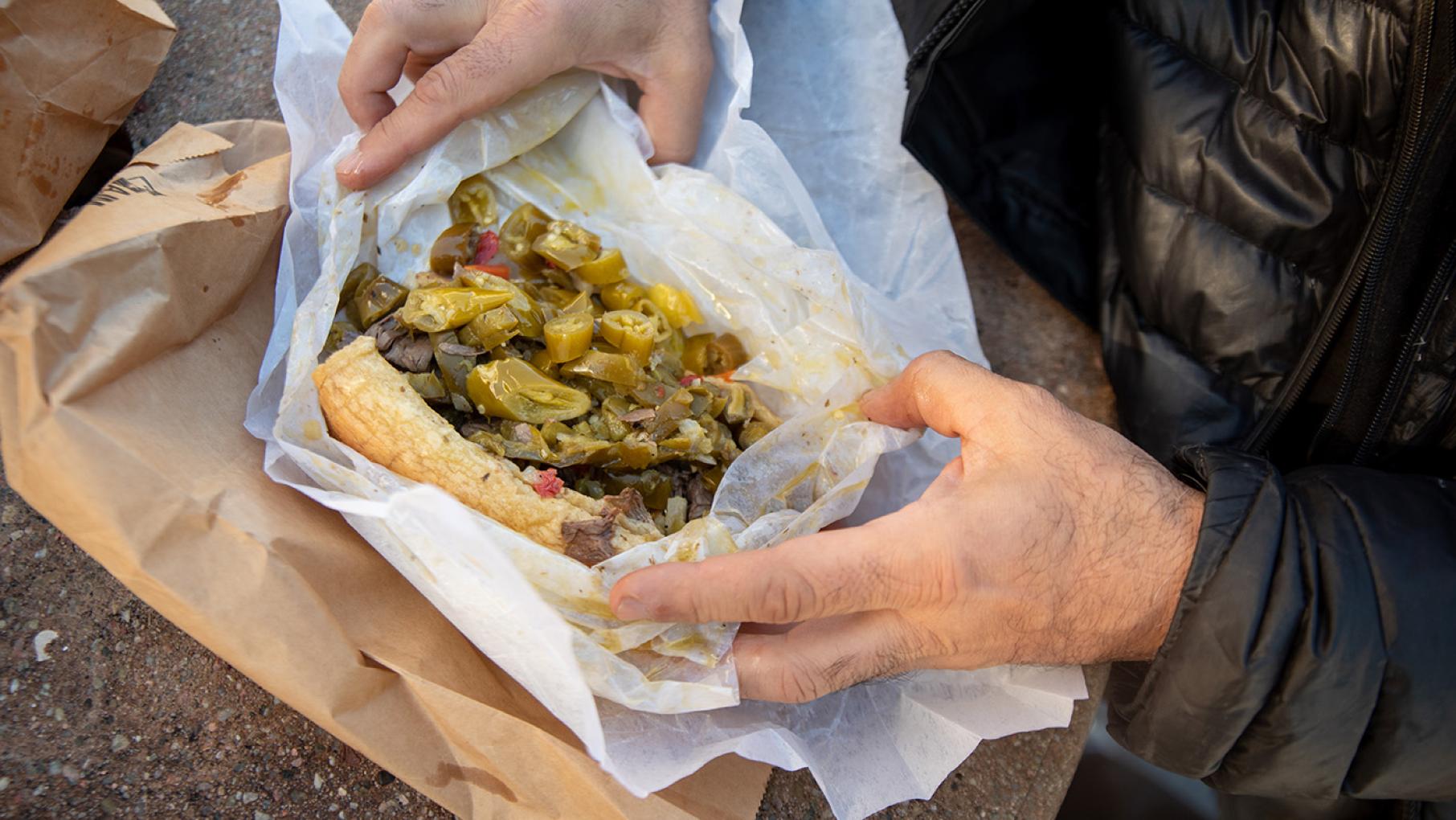 A file photo of an Italian beef sandwich from Johnnie's Beef in Elmwood Park. Credit: Kathleen Hinkel for WTTW. An Italian beef sandwich from Johnnie's Beef on a brown bag