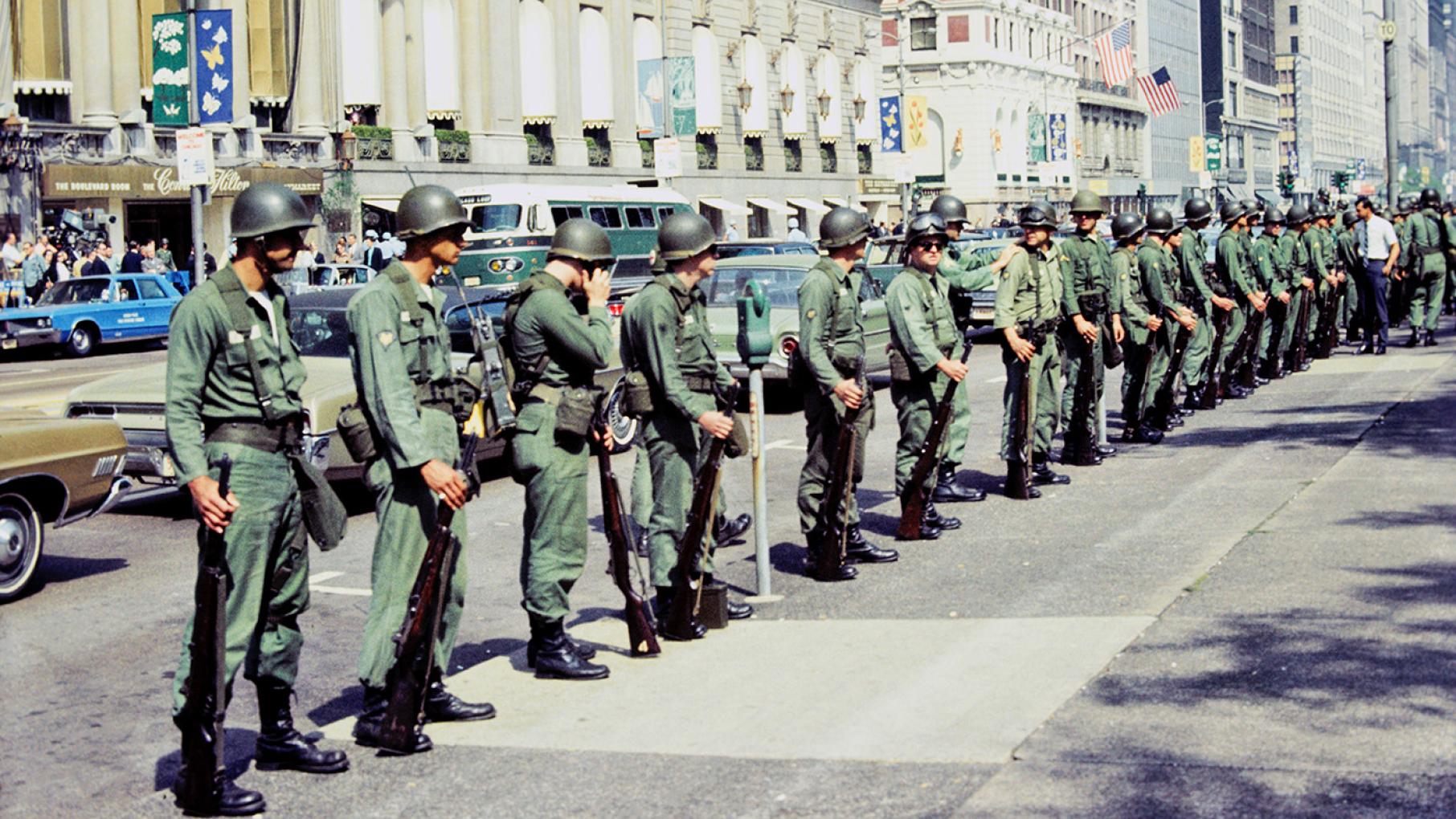 National Guardsmen line the street during the 1968 Democratic National Convention in Chicago. Credit: Chicago History Museum, ICHi-062713; Dr. Charles Roland, photographer National Guardsmen line the street during the 1968 Democratic National Convention, Chicago, Illinois, August 1968.