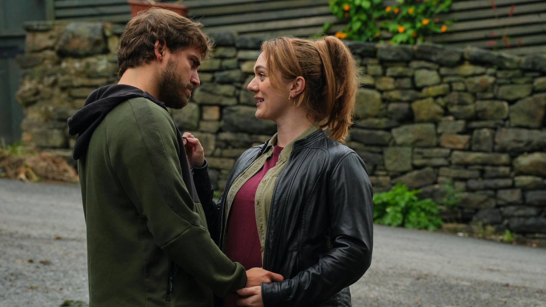 Can Tasha be trusted, or is she too attached to a suspect? Tasha and Liam hold hands outside