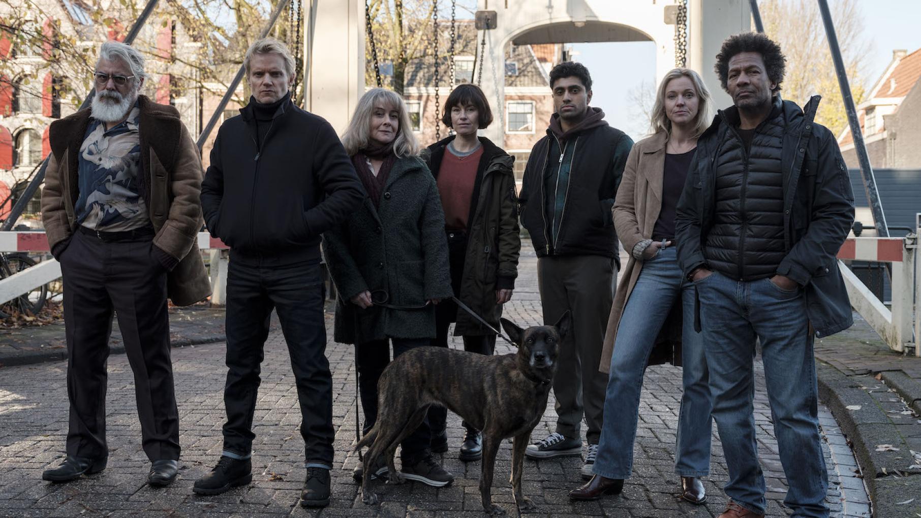 The cast of Van der Valk all stands together outside