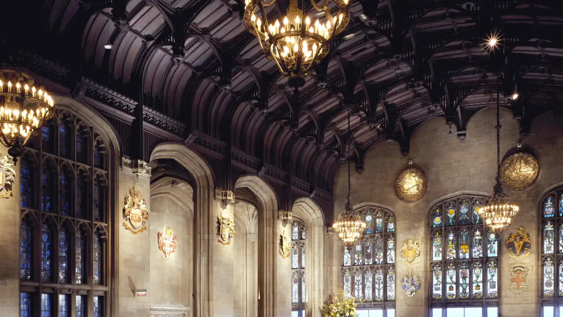 An ornate hall with chandeliers