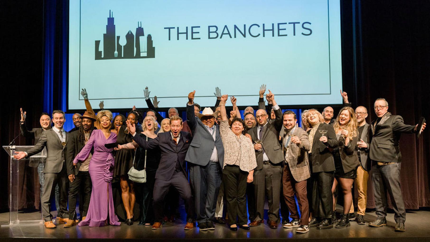 The winners of Chicago's 2024 Jean Banchet Awards. Credit: Caitlin Lisa The winners of the Jean Banchet Awards pose onstage under a screen that says The Banchets