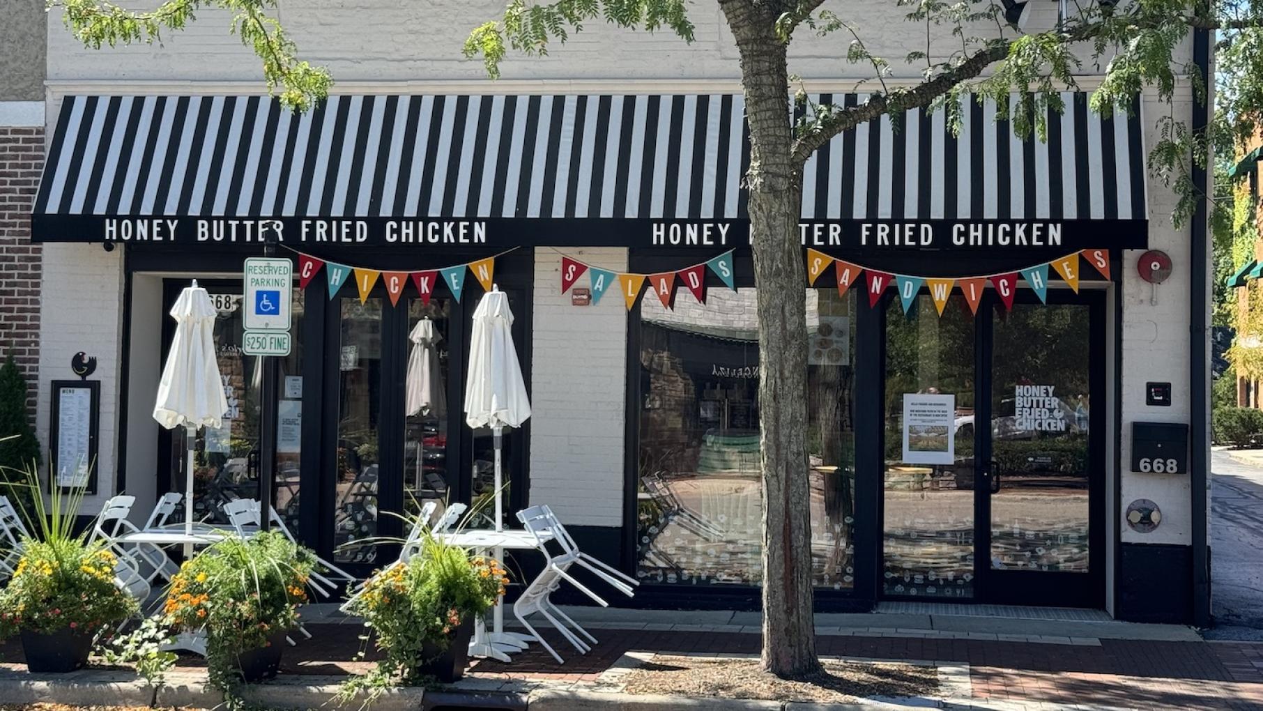 While dine-in business at Honey Butter Fried Chicken's Glencoe shop was good, it never received the amount of takeout and delivery orders it needed to survive. Credit: Christine Cikowski The exterior of a restaurant with an awning