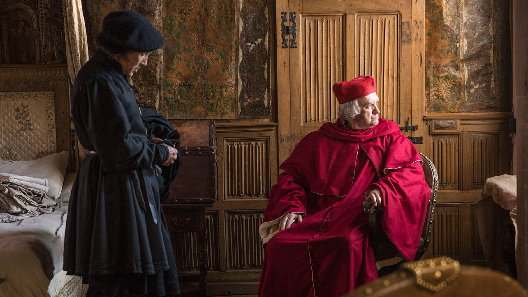 Cromwell refuses to abandon Cardinal Wolsey even after his fall from grace. Credit: Masterpiece Thomas Cromwell stands next to a seated Cardinal Wolsey, who looks out a window