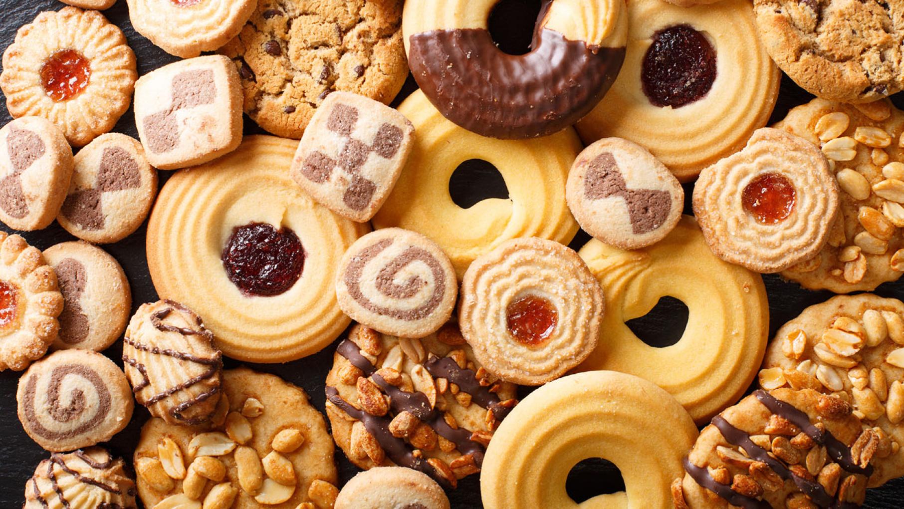 Credit: iStock Various holiday cookies spread out on a table
