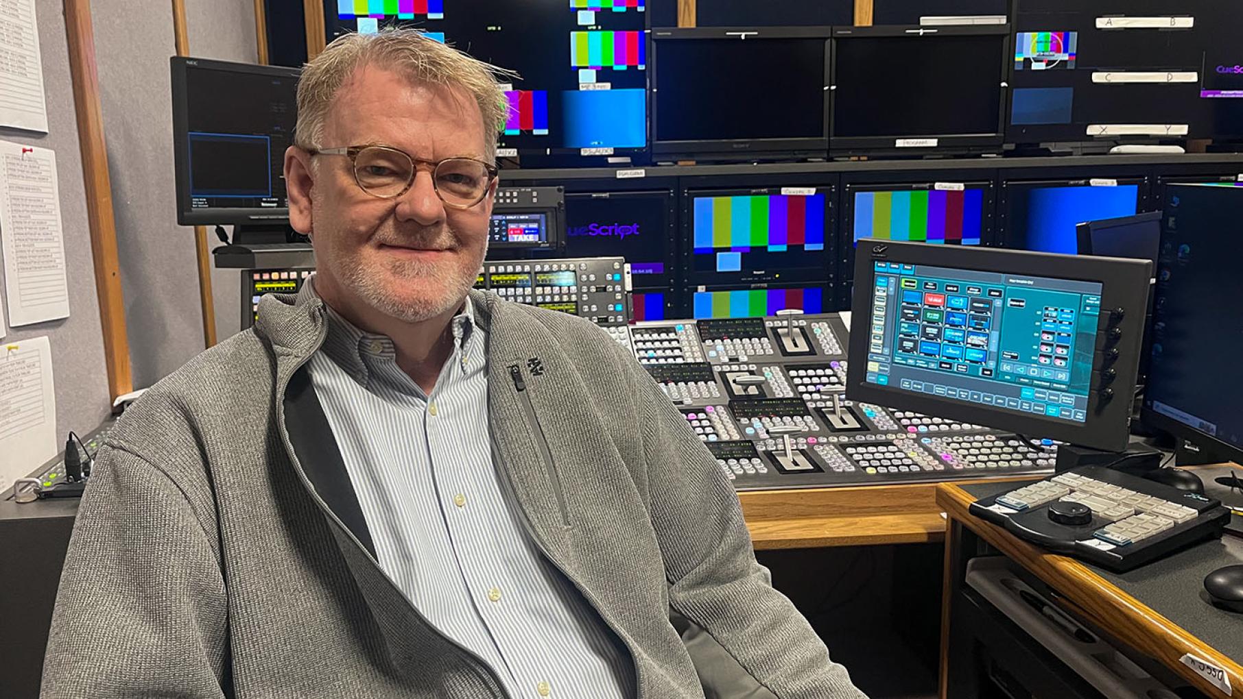 Craig Harrison sitting in a WTTW control room.