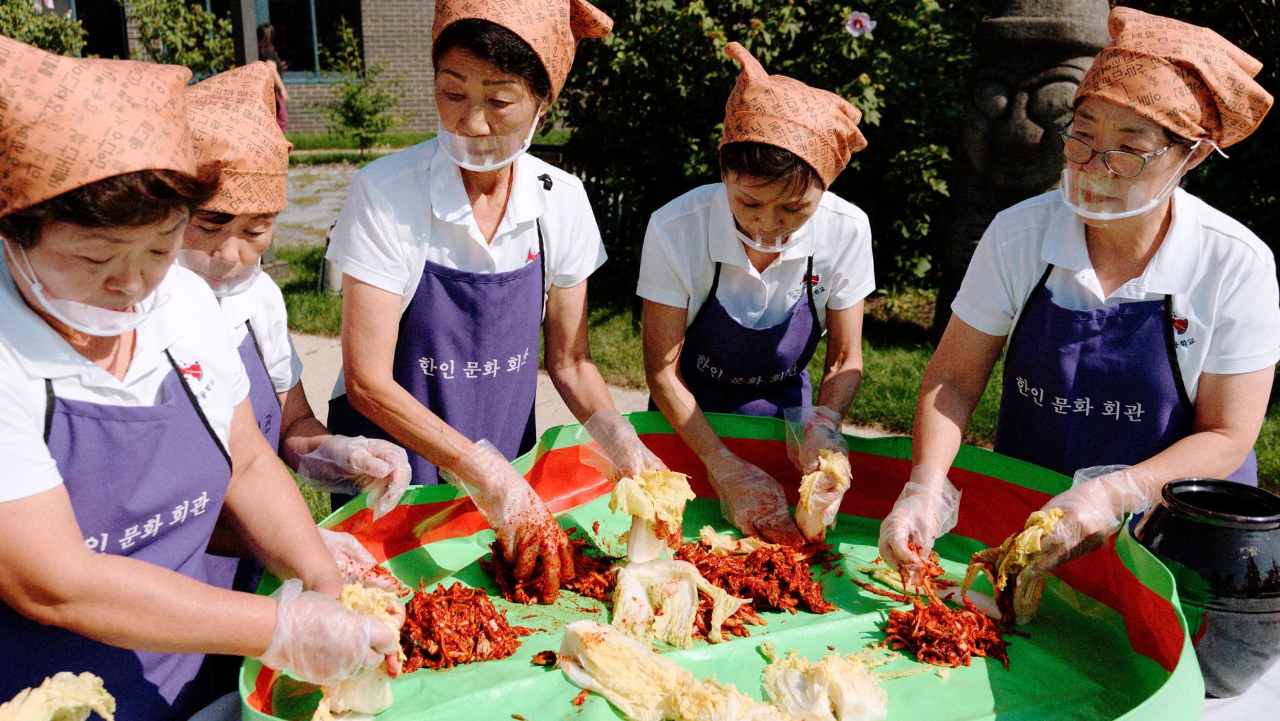 Women preparing kimchi
