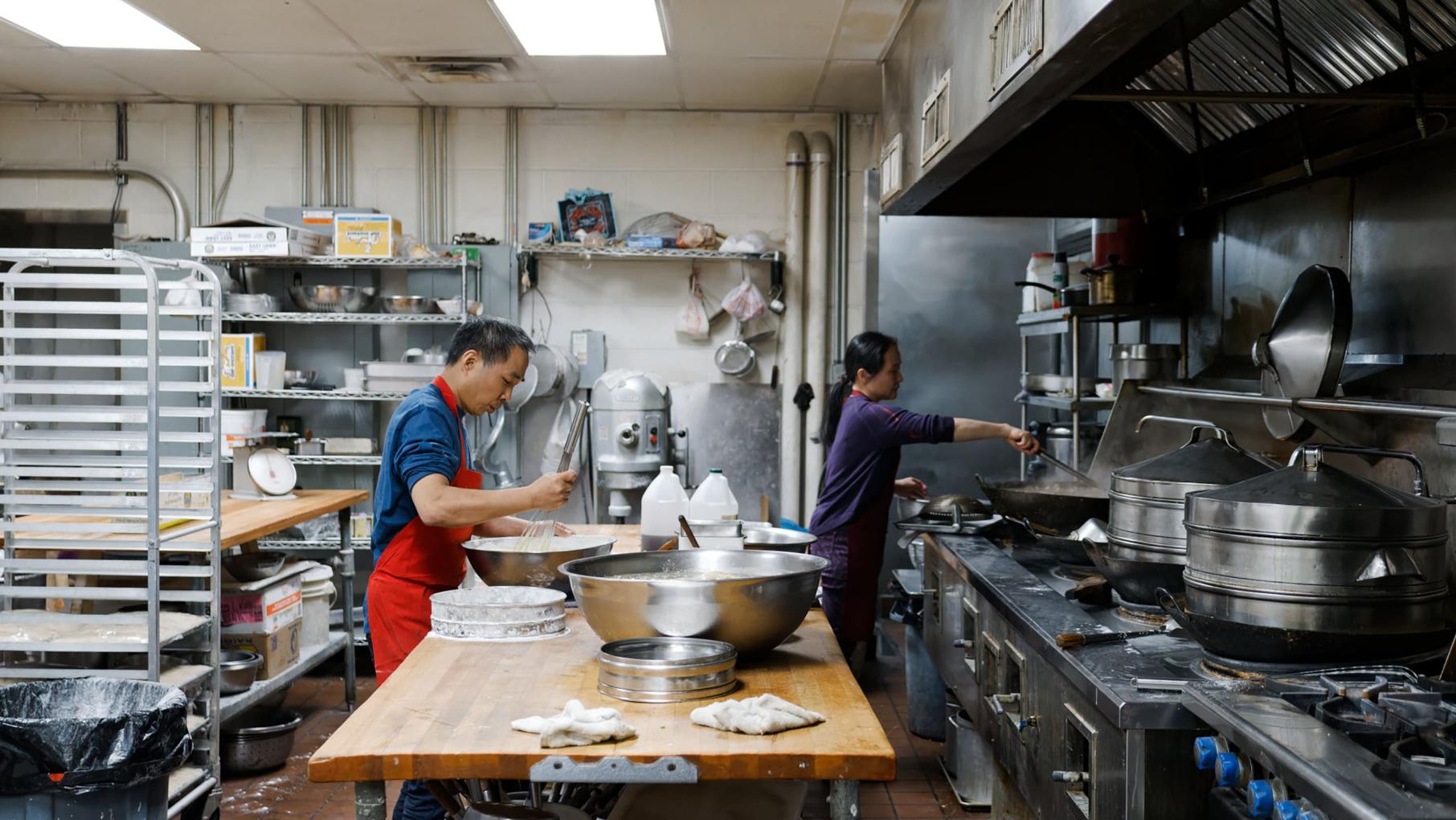 Backers prepping dough and cooking fillings.