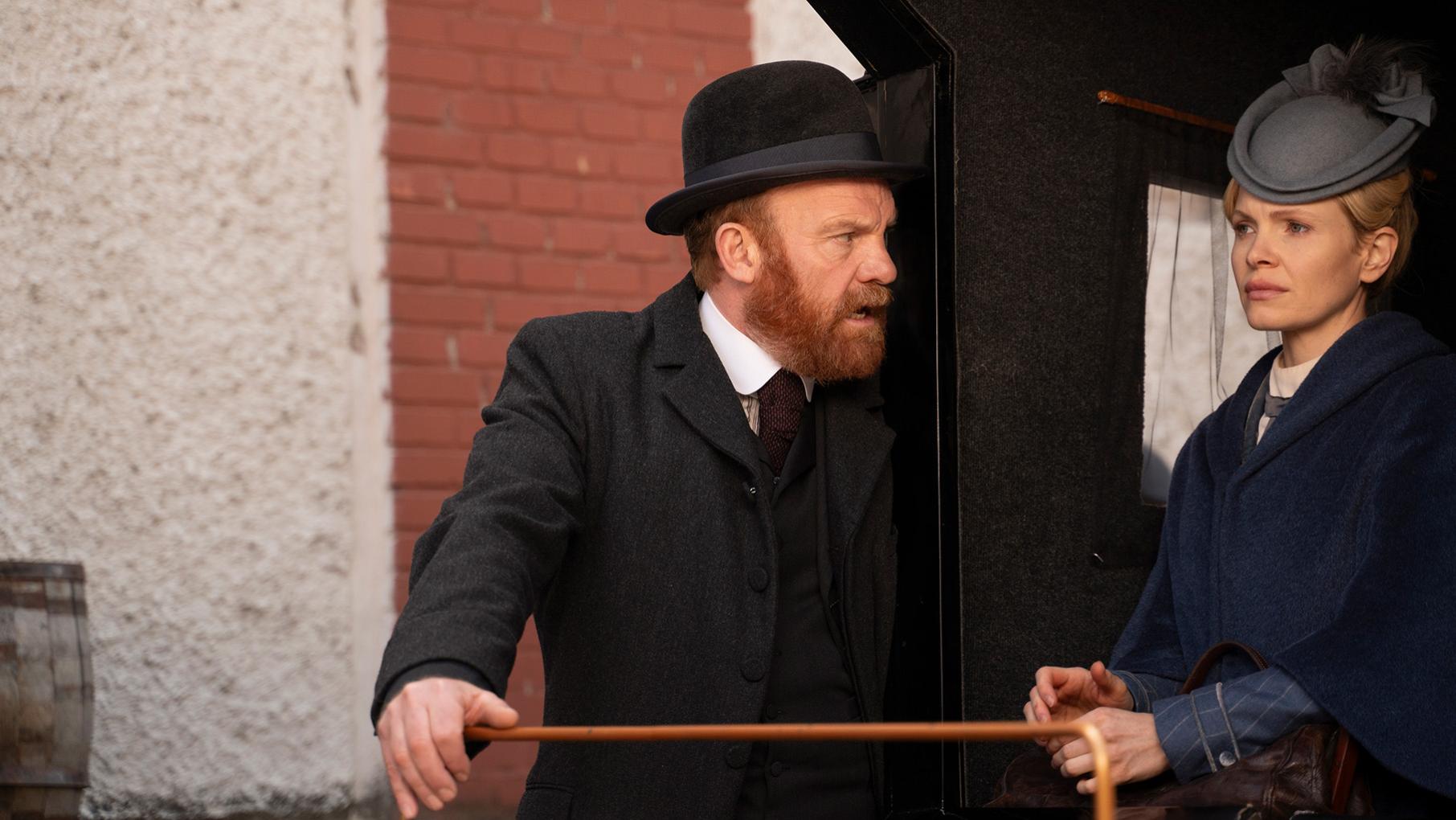 Phelps and Eliza both undertake independent investigations when a popular composer is killed. Credit: Masterpiece Phelps pushes into a carriage in which Eliza is sitting