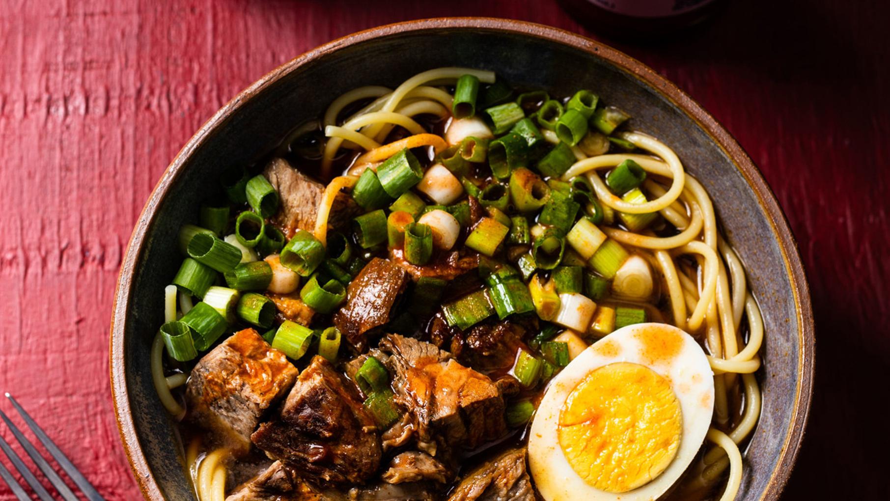 Credit: Cook's Country A bowl of yakamein with eggs, scallion, noodles, and beef in broth